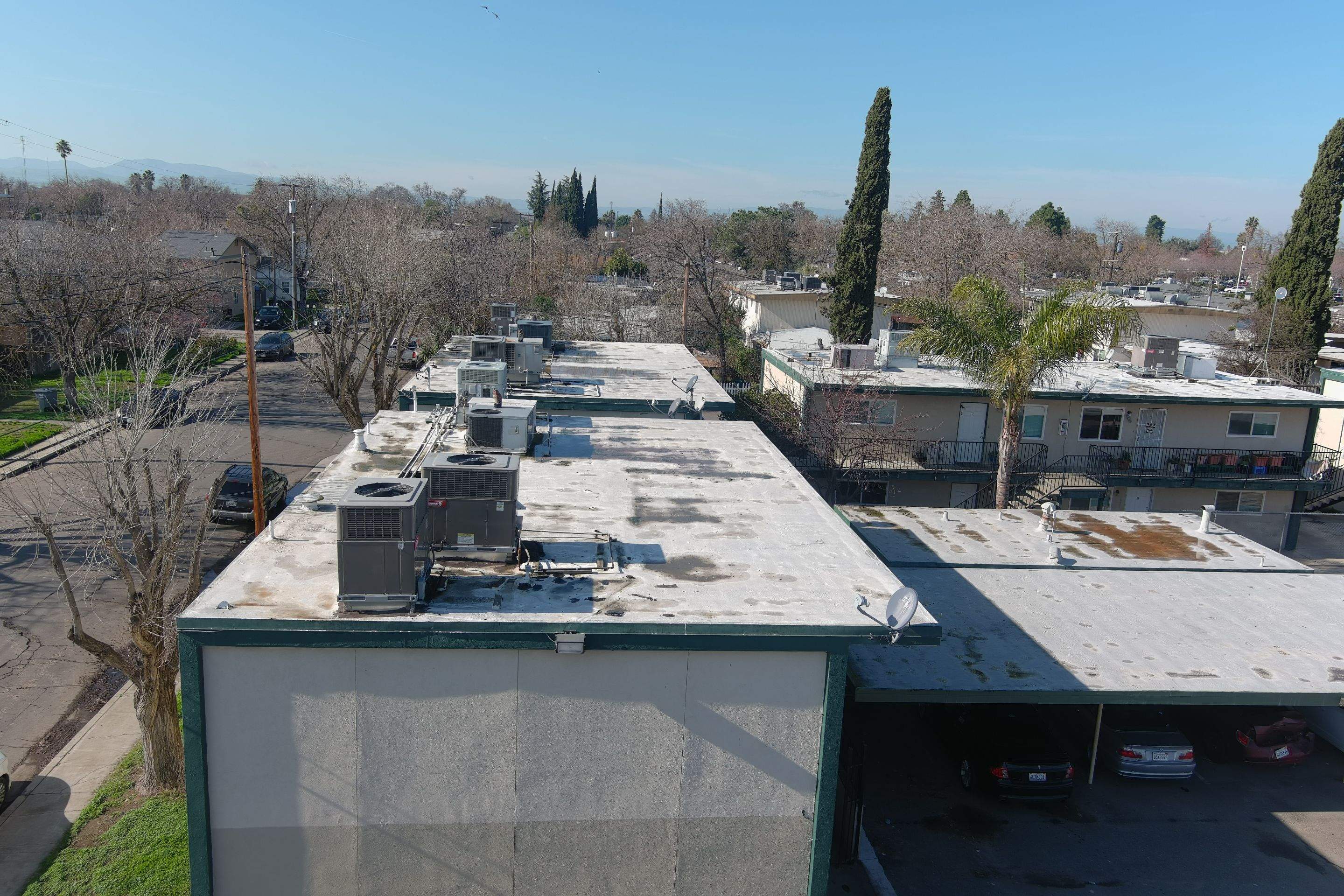 Foam Refurbish using General Coatings acrylic coatings and spray foam by Straight Edge Roofing Inc