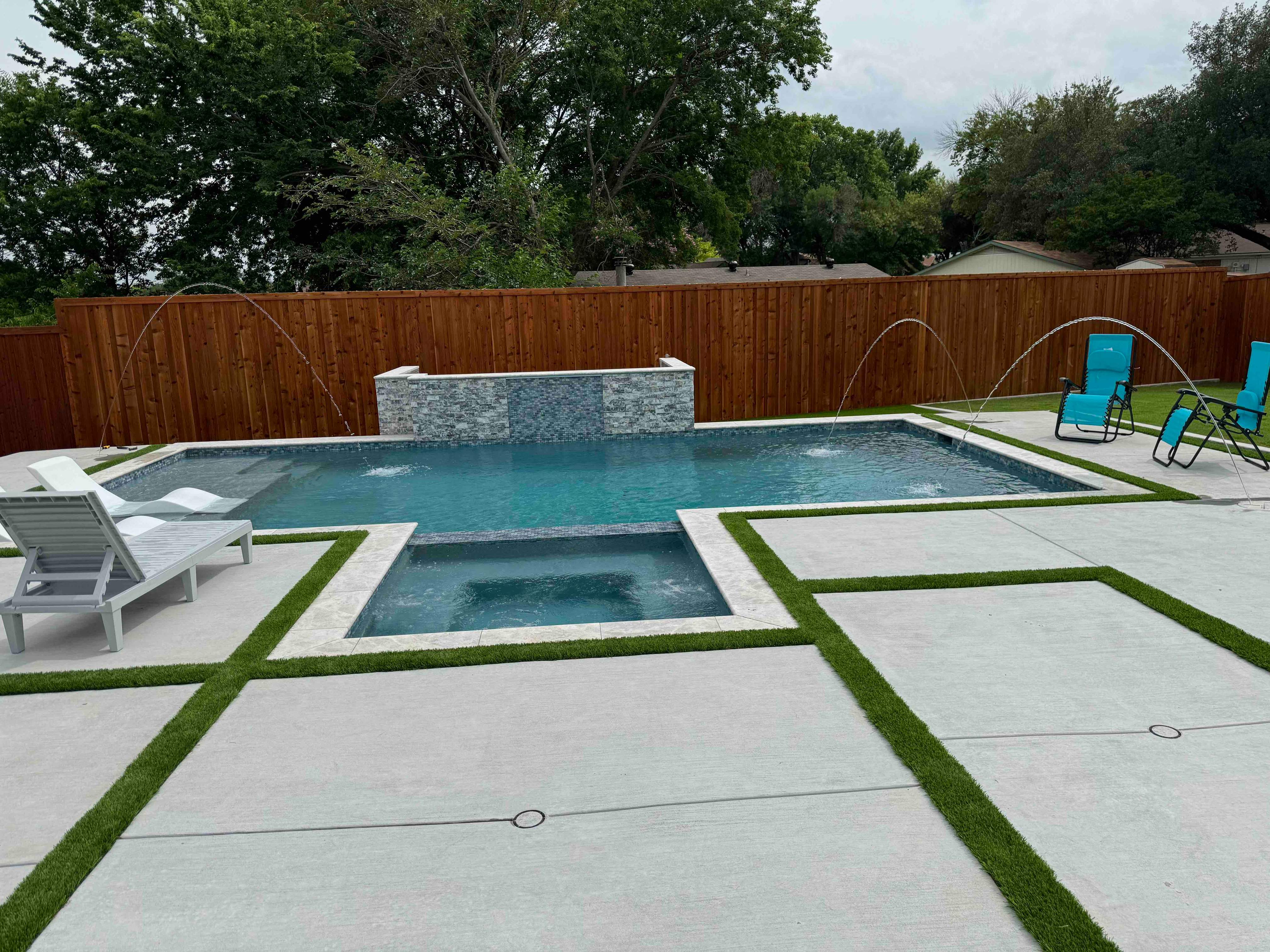 Geometric Pool with Raised Spa and Stone Coping by Pinnacle Pools and Spas - DFW