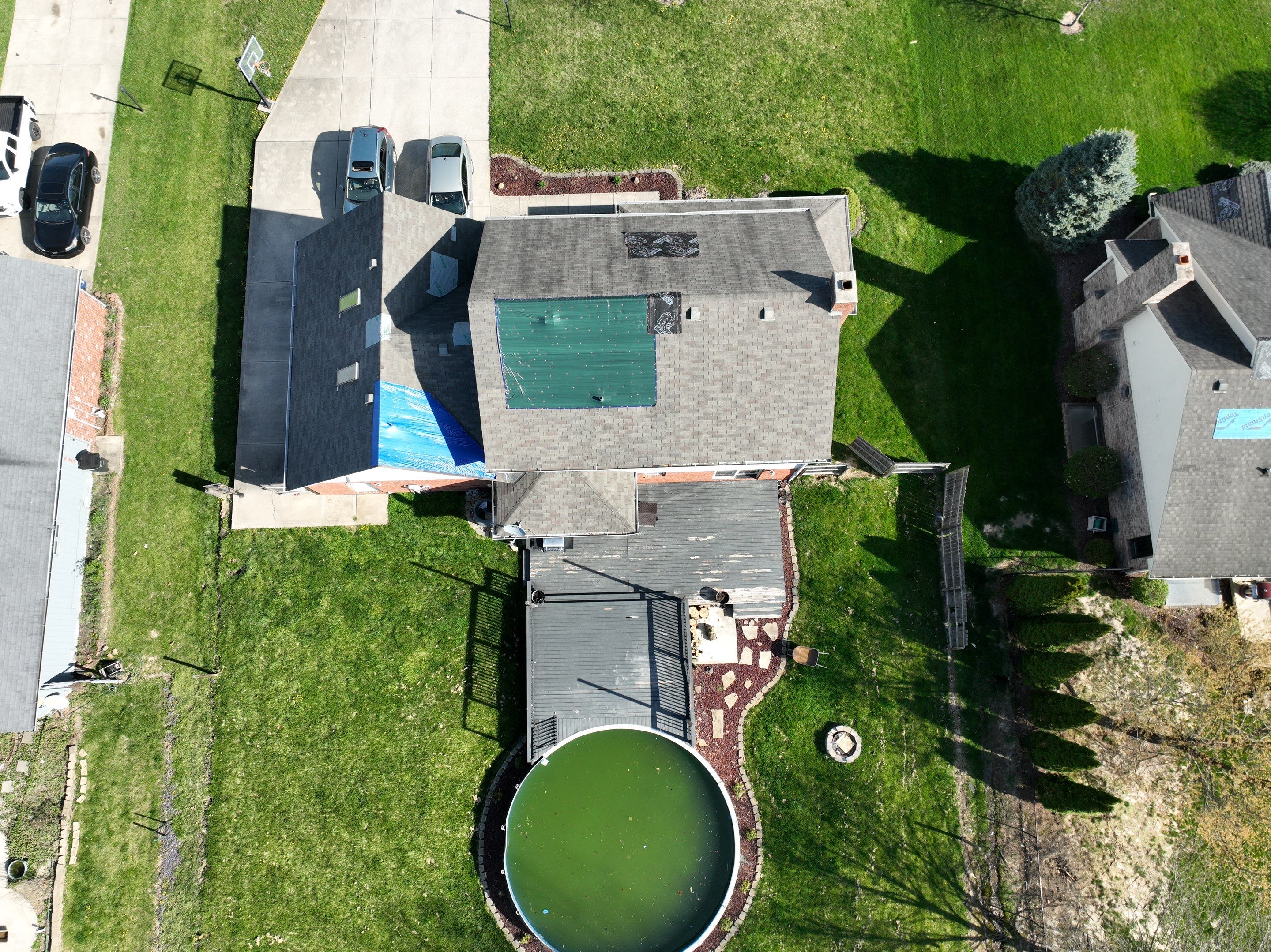 Tornado damage in Whiteland. Roof replacement, James Hardie siding, exterior paint, gutters, windows, doors by 317 Roofing & Restorations