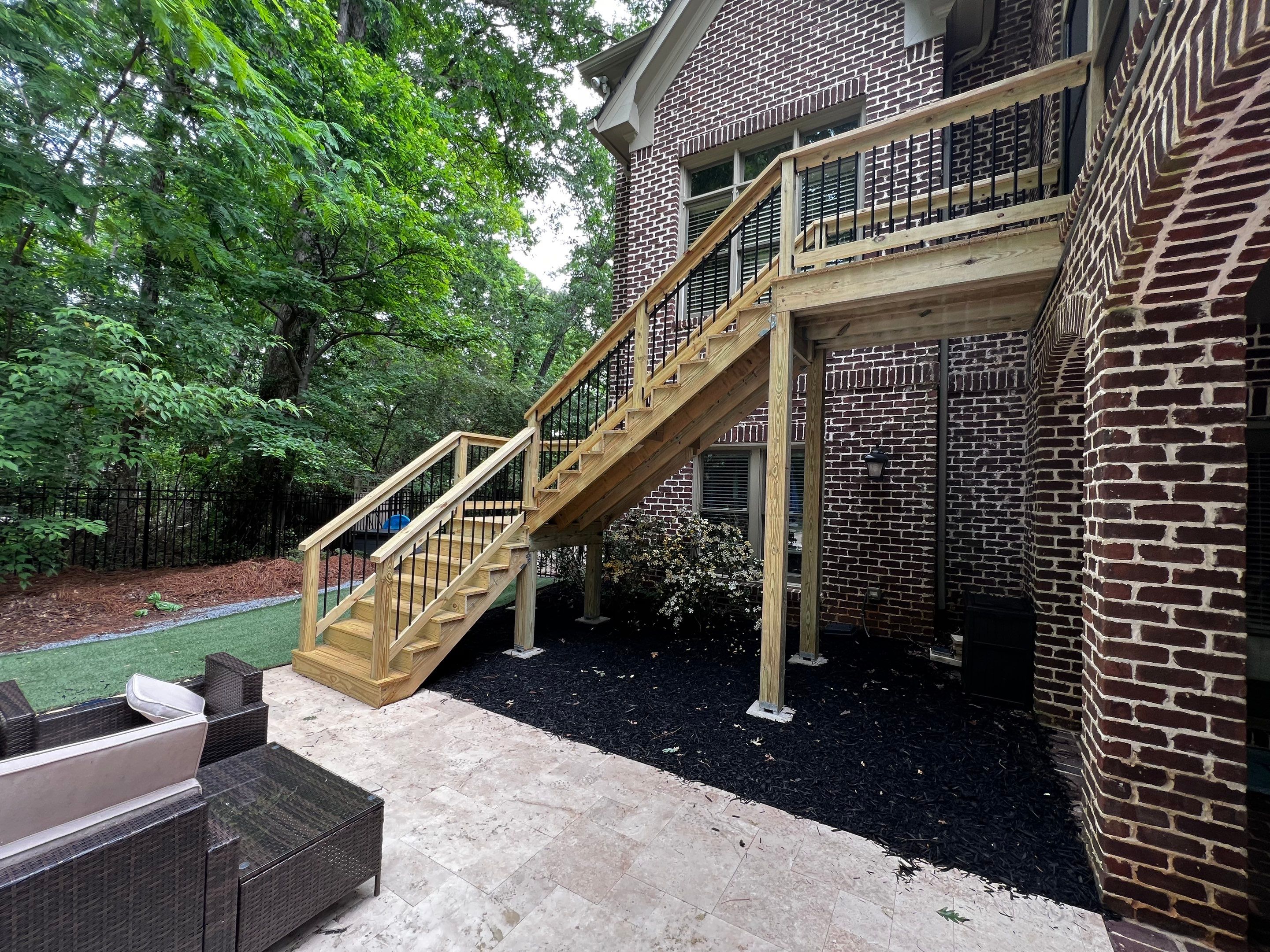 Custom Deck Stairway Addition with Metal Balusters in Atlanta by Swift Home Renovations 