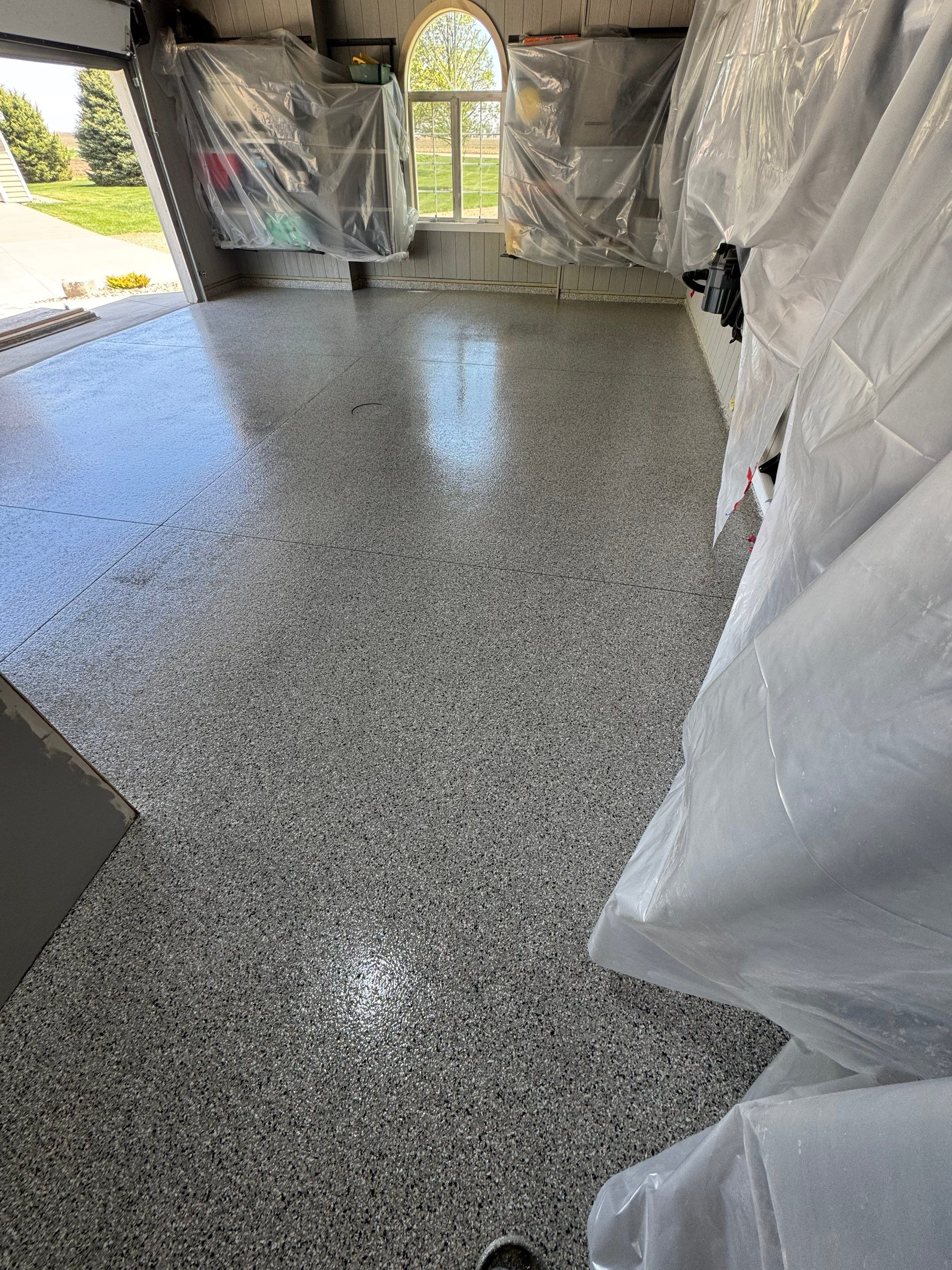 High-Gloss Grey Epoxy Floor Coating for Inwood Garage by Select Painting, Coatings & Garage Cabinets