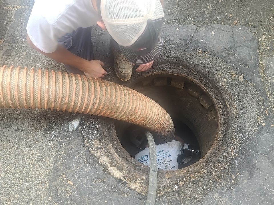 Sewer Repair using Perma-Liner through two manholes by Sureway Comfort John Wilcox Plumbing Heating Cooling