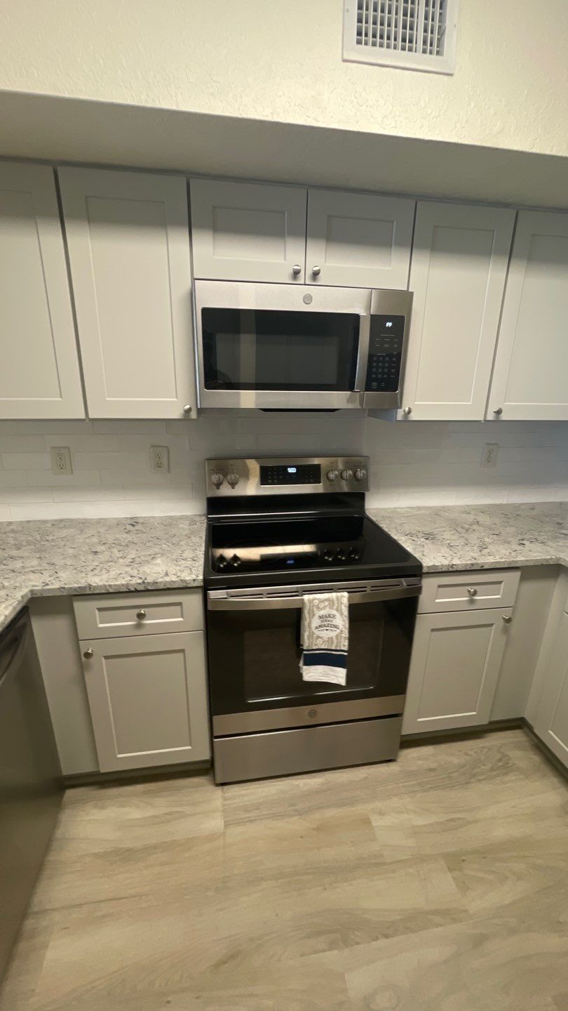 Home Remodel using LVP Flooring and Cabinets by HandyMangum