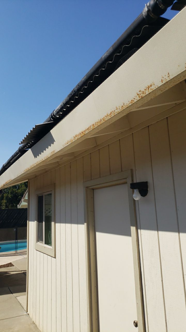 Roofing and Gutters to protect this home by Byers Enterprises 