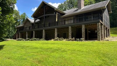 Custom Composite Deck Construction with Stone Pillars in Fayetteville