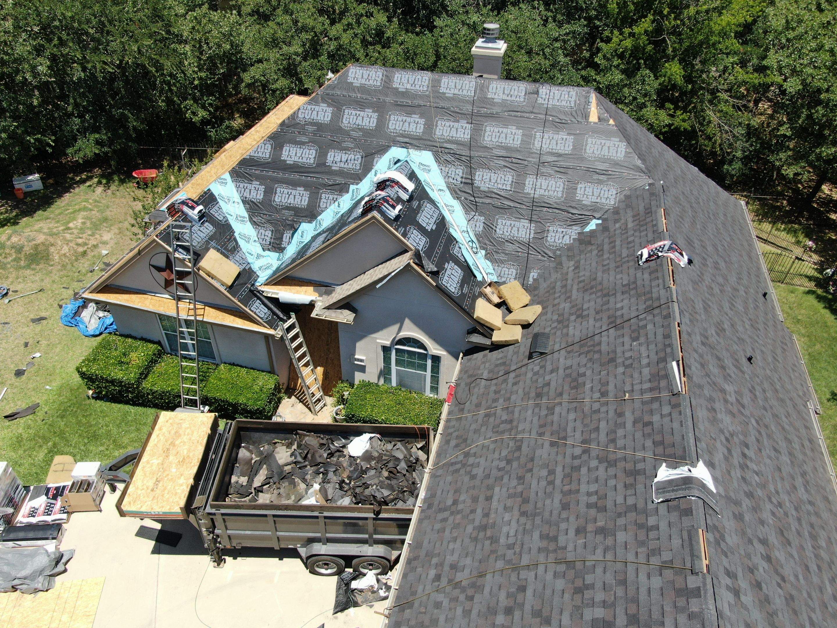 Residential Roof Replacement Using Tamko Titan Shingles in Runaway Bay by Armor Roofing | Exteriors
