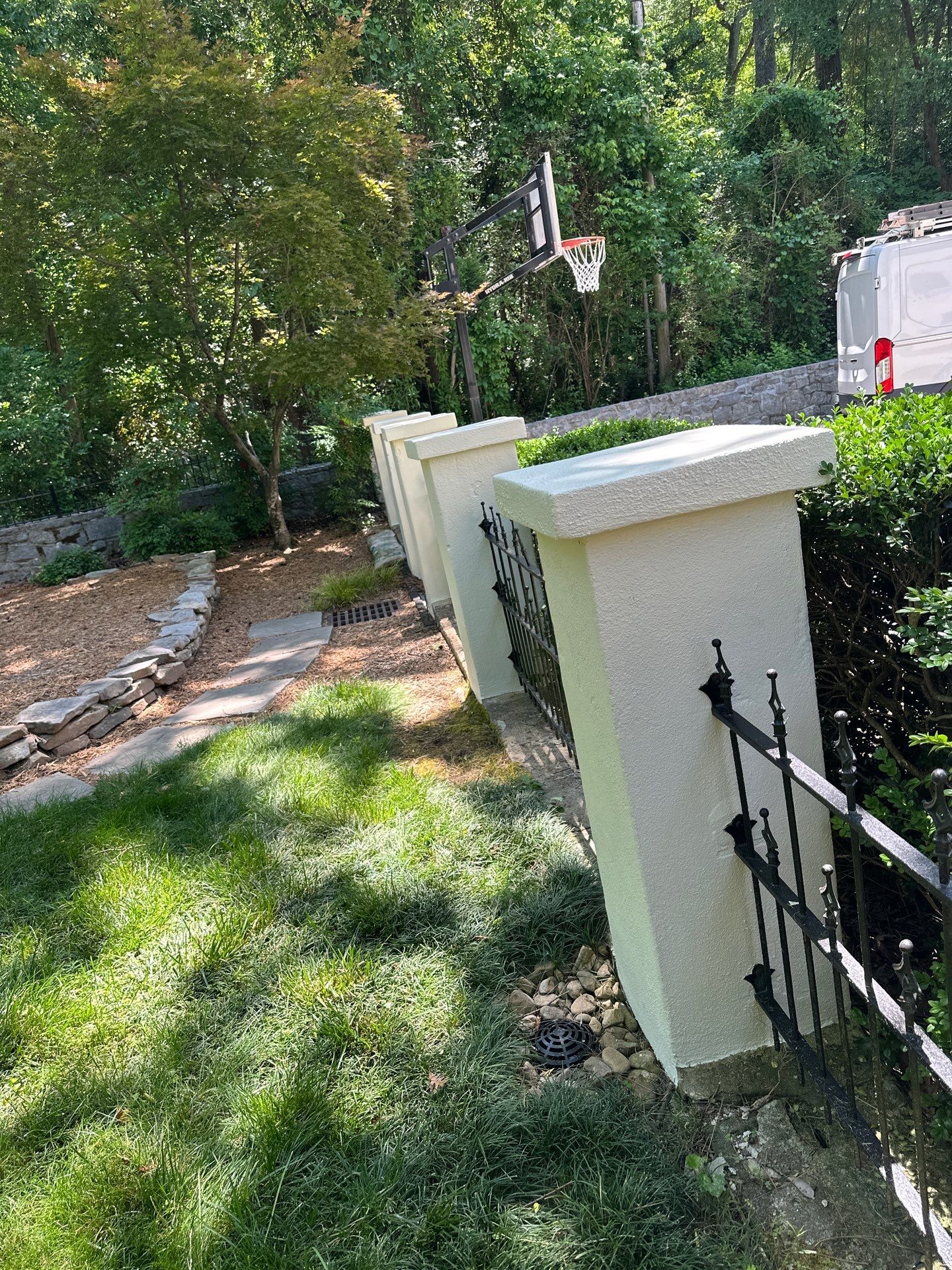 Rear Exterior Upgrade: Railings, Fence, and Stucco Column Restoration by Atlanta's Paint Doctor