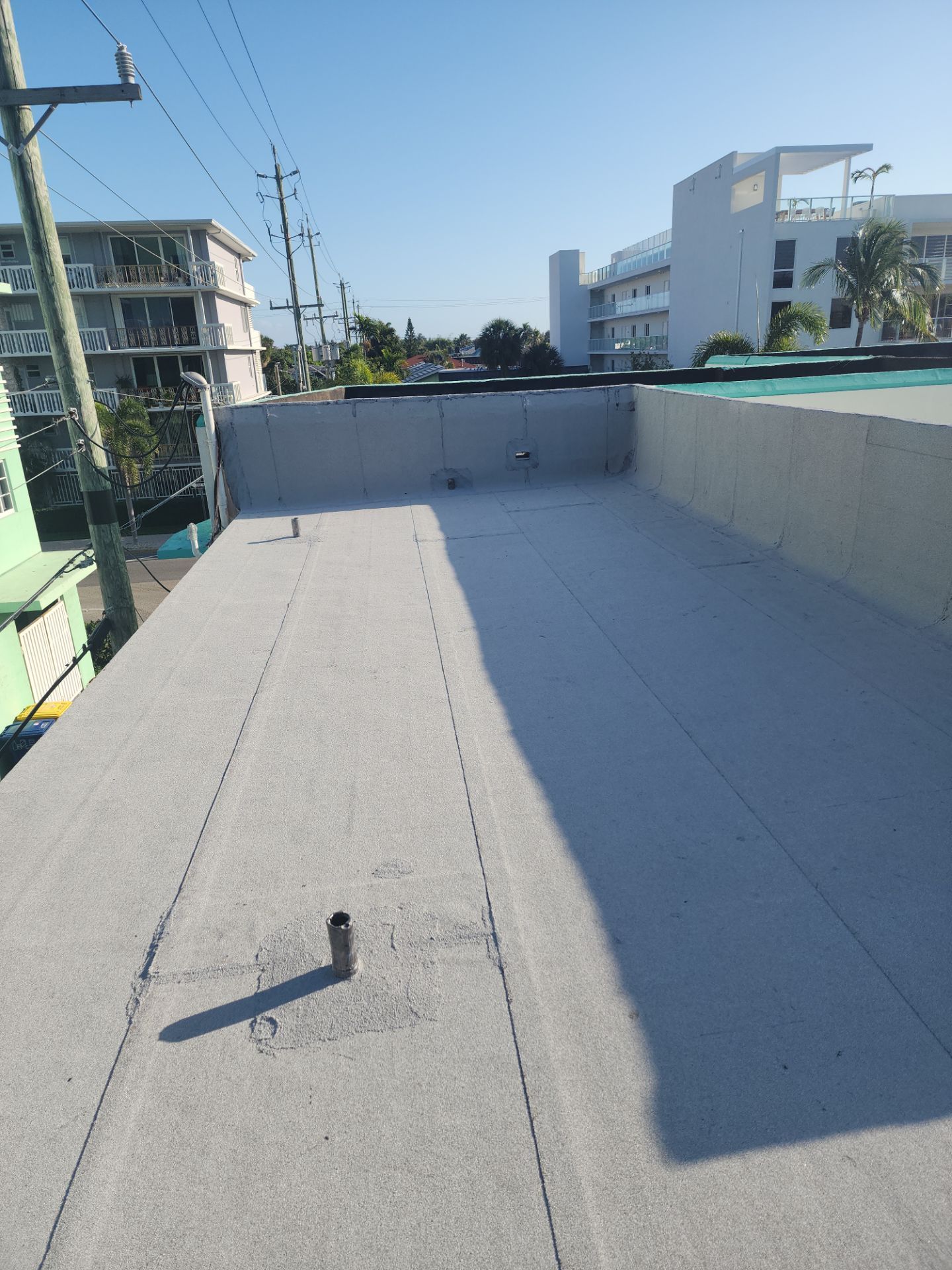 Flat Roof Replacement and Insulation Upgrade in Lake Worth Beach by Aastro Roofing