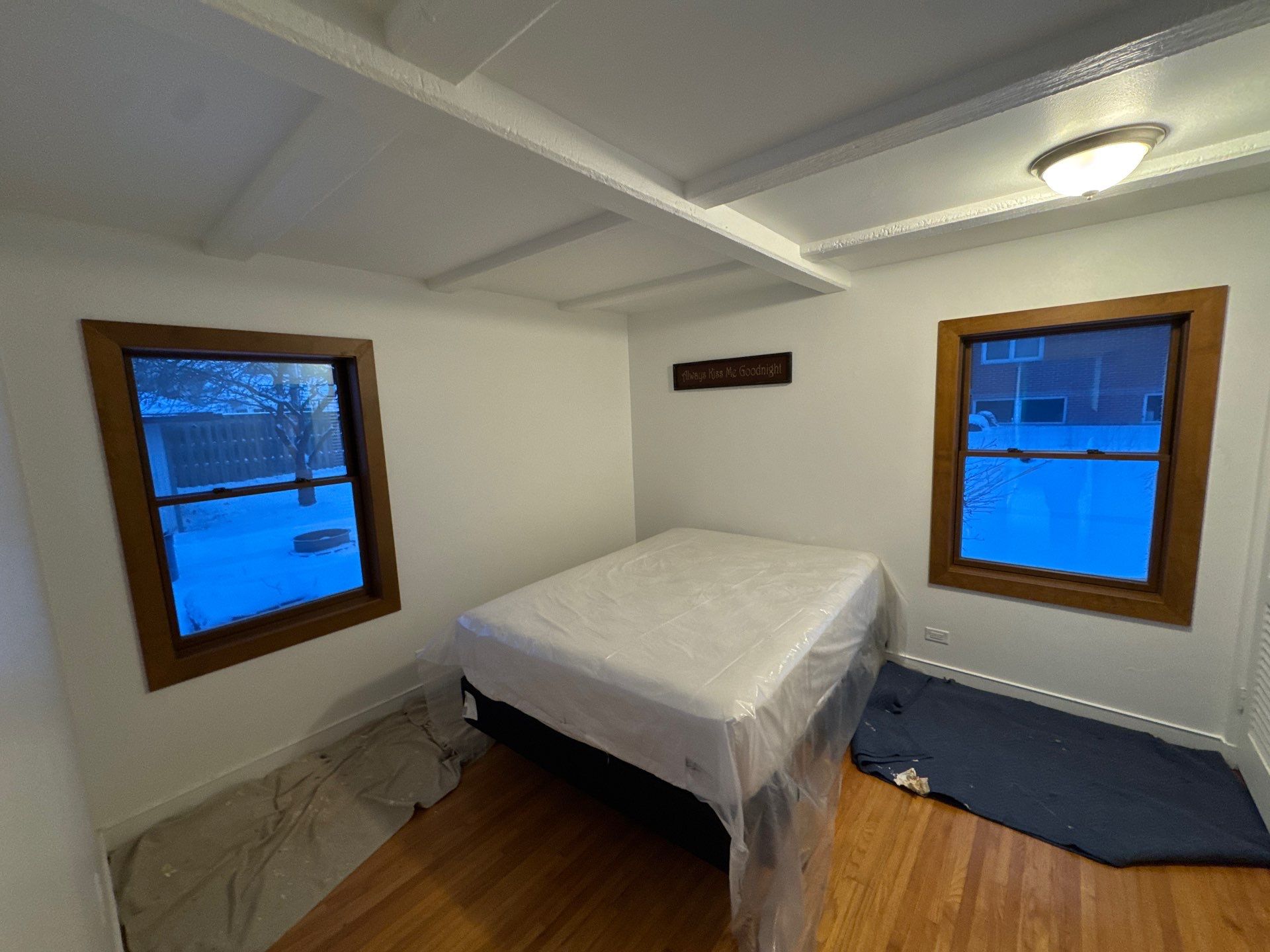 Black-Frame Pella Lifestyle Upgrade on a Partial Brick Home by United Windows and Siding LLC