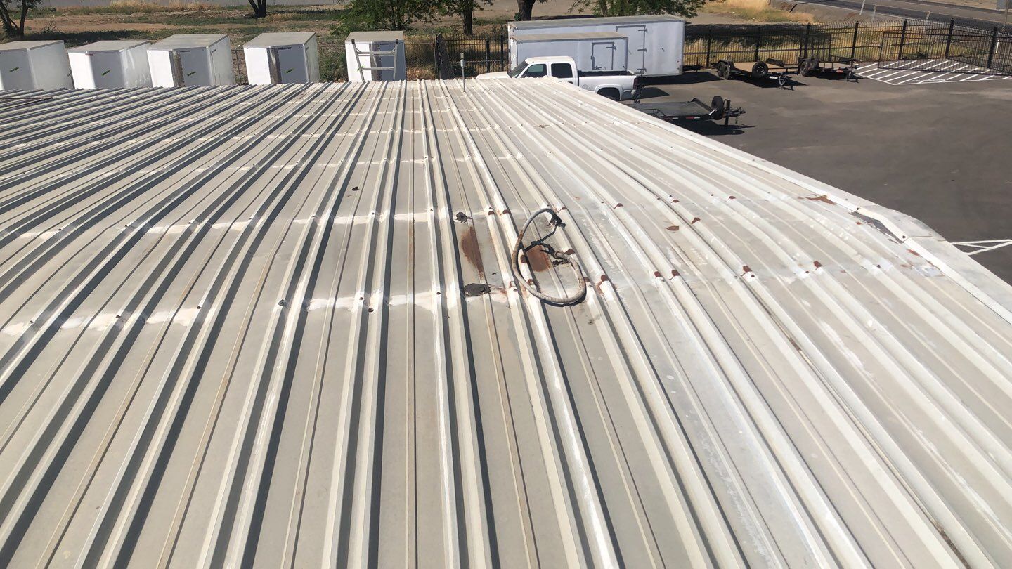 Metal Restoration Roofing system with Benchmark/PUMA XL 20 yr warranty by Straight Edge Roofing Inc