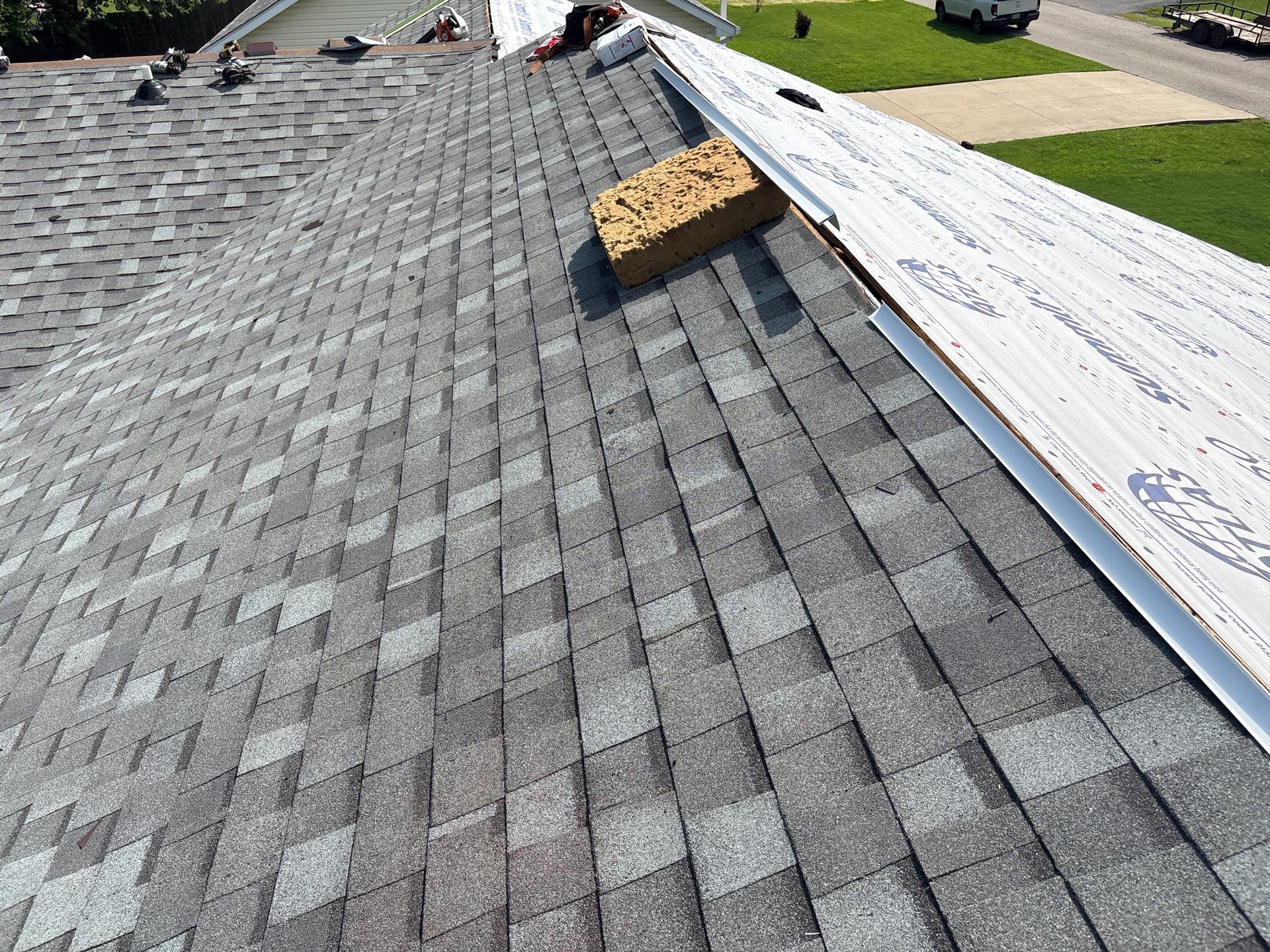 Residential Roof + Gutters & Downspouts Install  by Titan Commercial & Residential Roofing 