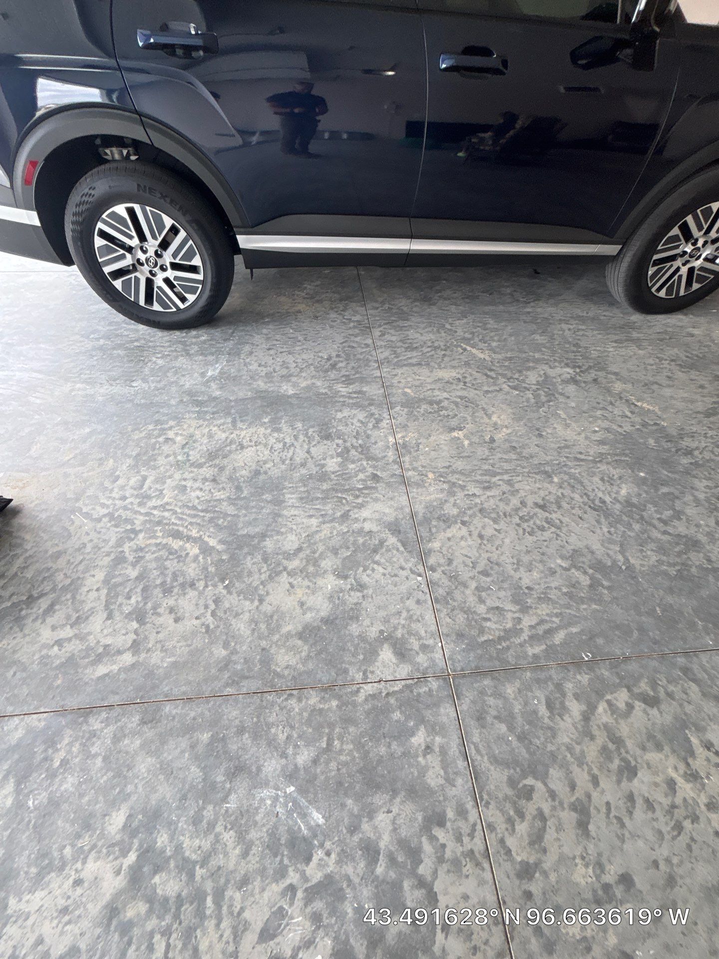 Full Speckled Concrete Coating for Sioux Falls Garage by Select Painting, Coatings & Garage Cabinets