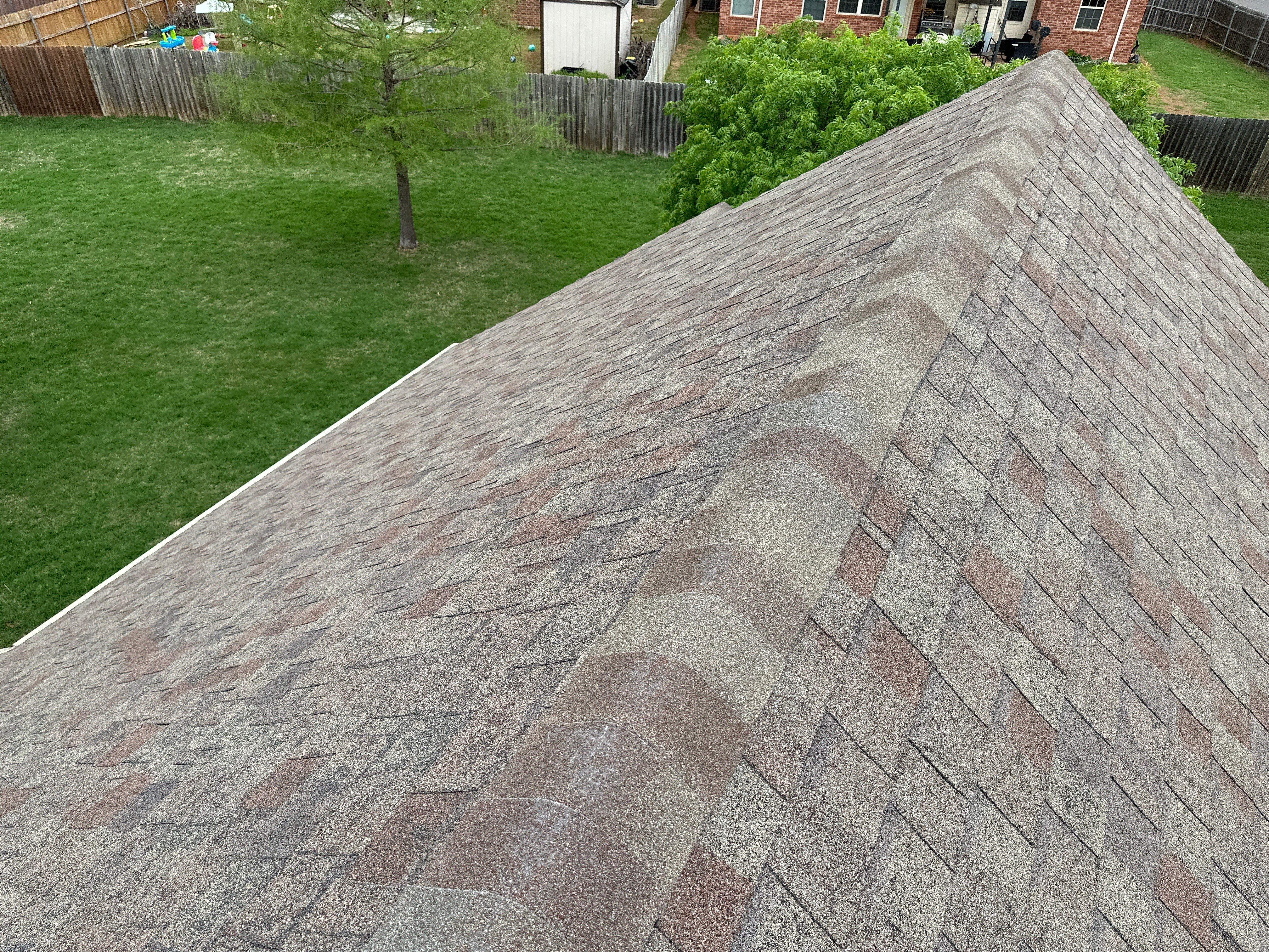 Reroof using Owens Corning Duration Storm IR in Driftwood by Castillo Roofing