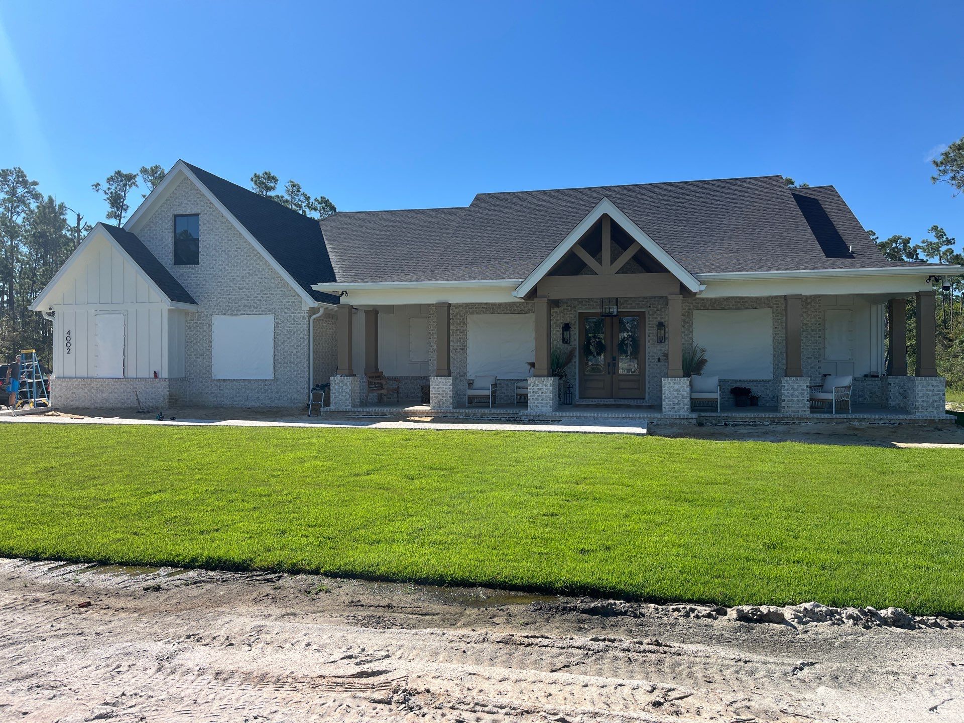 Custom Hurricane Fabric Storm Shutter Installation in Panama City by Brannan Aluminum Inc.