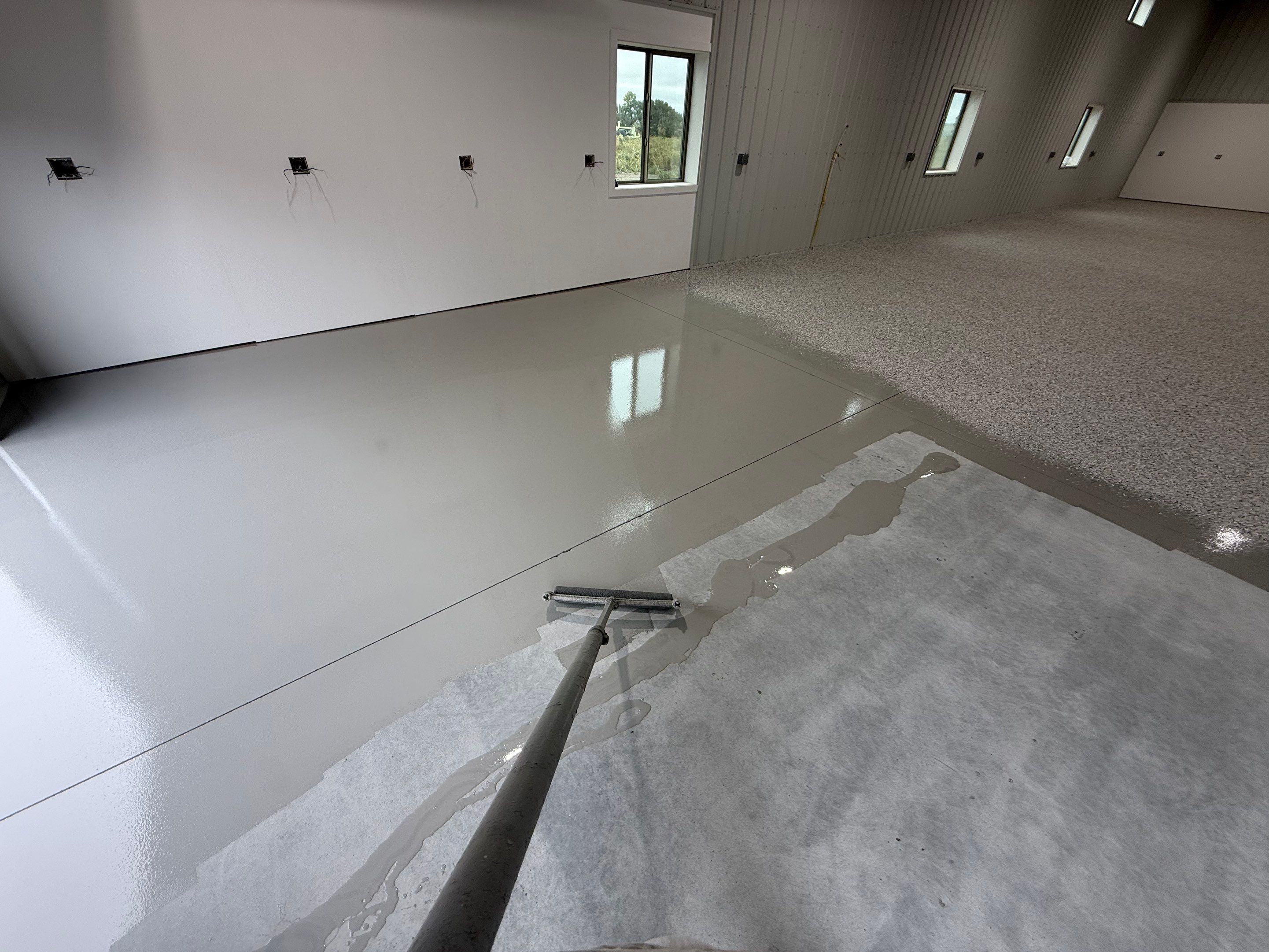 Custom Speckled Floor Coating for Large Montrose Shop by Select Painting, Coatings & Garage Cabinets