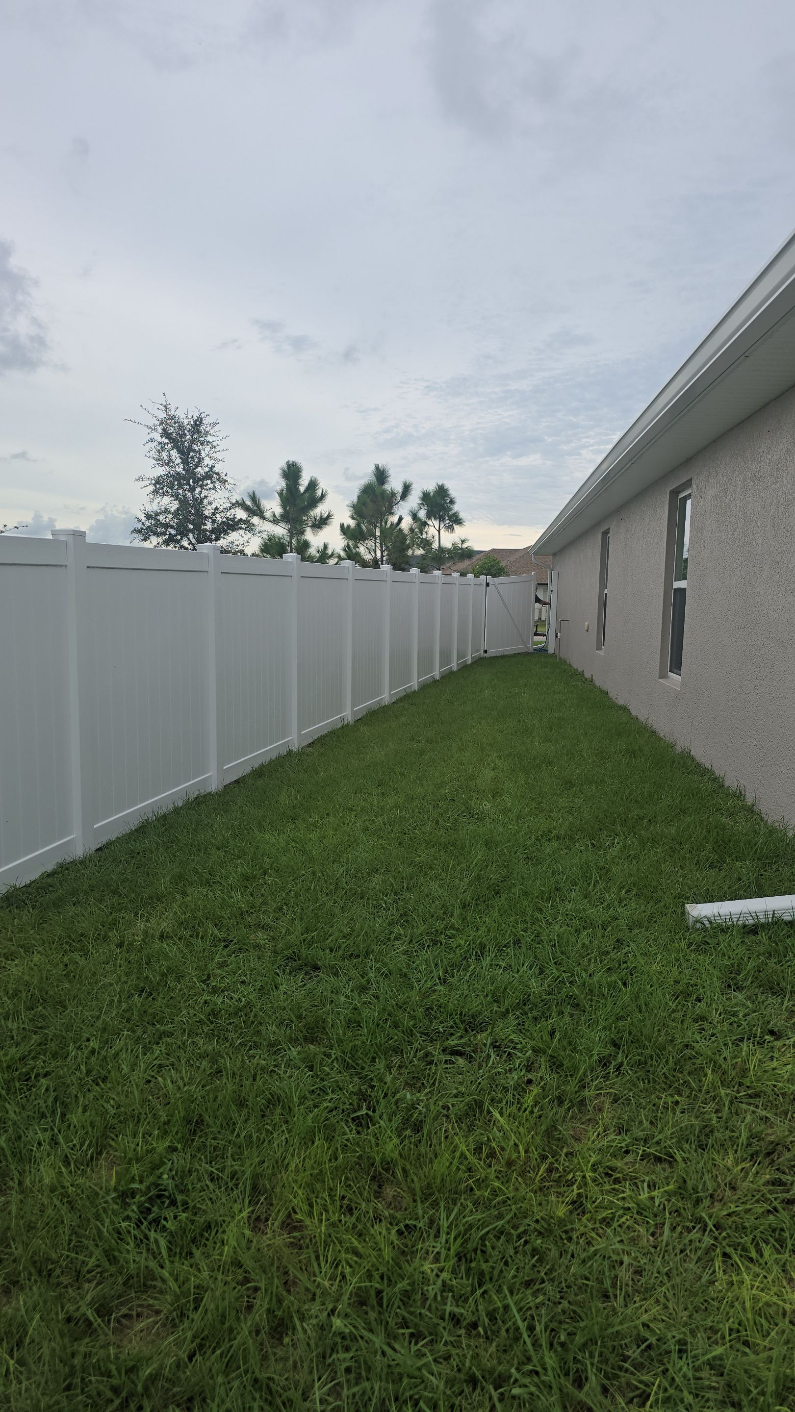 White Vinyl Privacy Fence Installation for North Port Residence by True Fence LLC