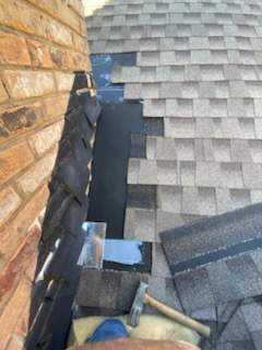 Cricket and Flashing Repair  by Rhino Roofing and General Contracting, LLC