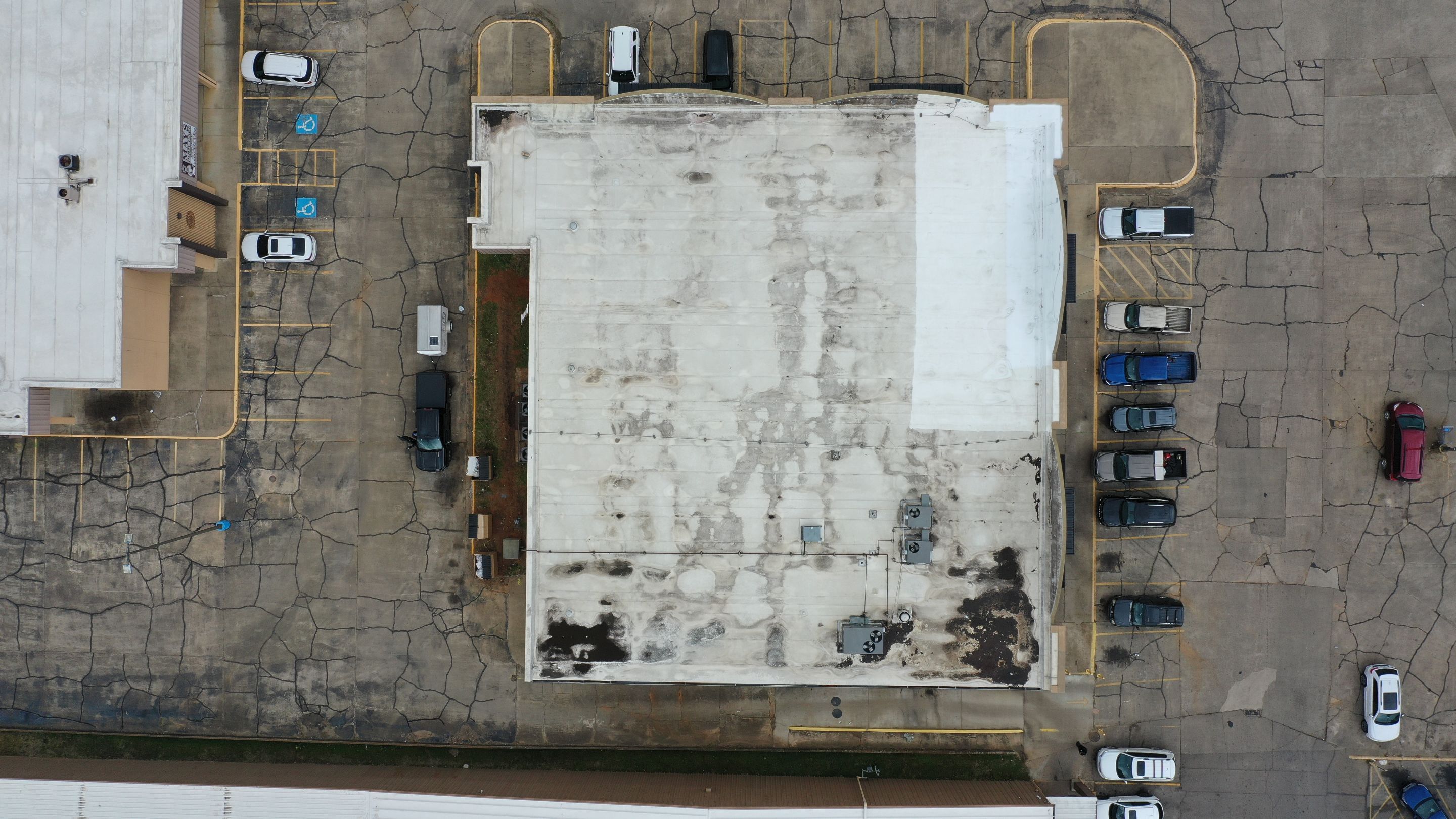 Commercial Roofing Installation using Aldocoat Coatings by Hostetler Roofing