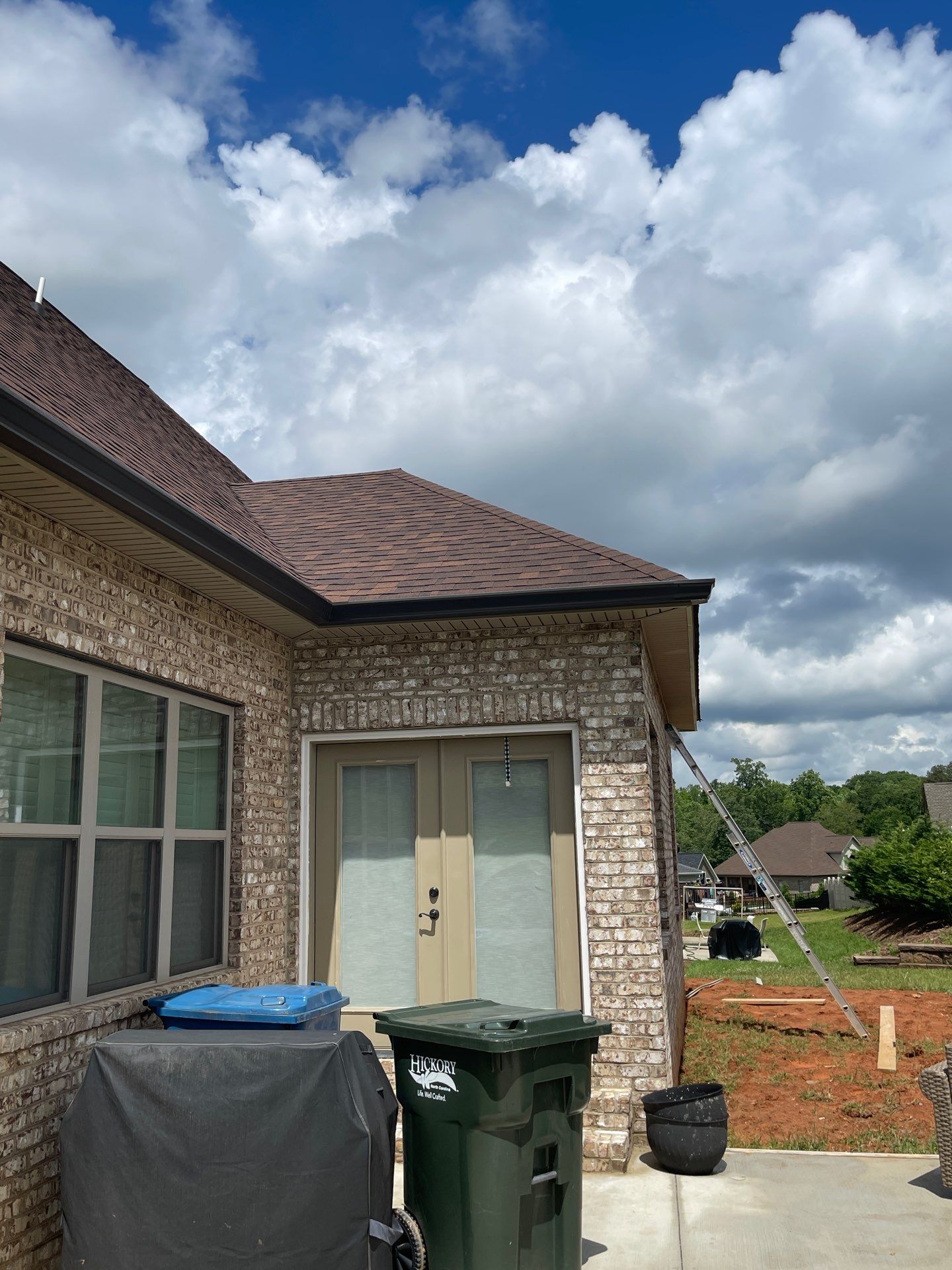 6" Seamless Gutters in Dark Bronze by Peak 2 Peak Services LLC