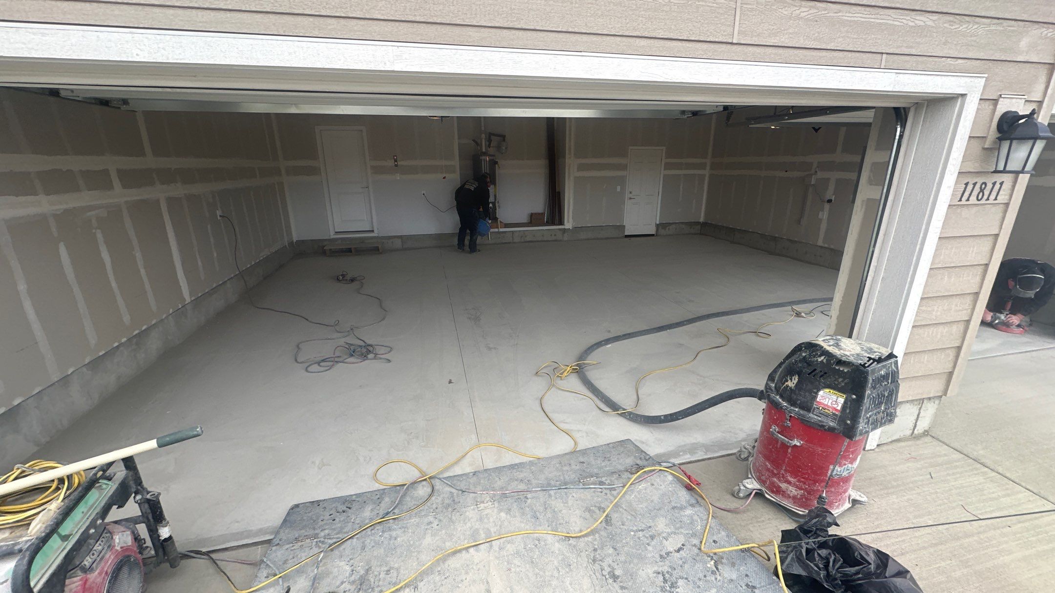 Garage Transformation using Sandstone by Croc Coatings, LLC