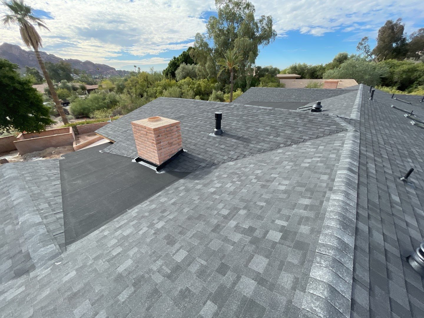 Onyx Black Shingles by Reimagine Roofing
