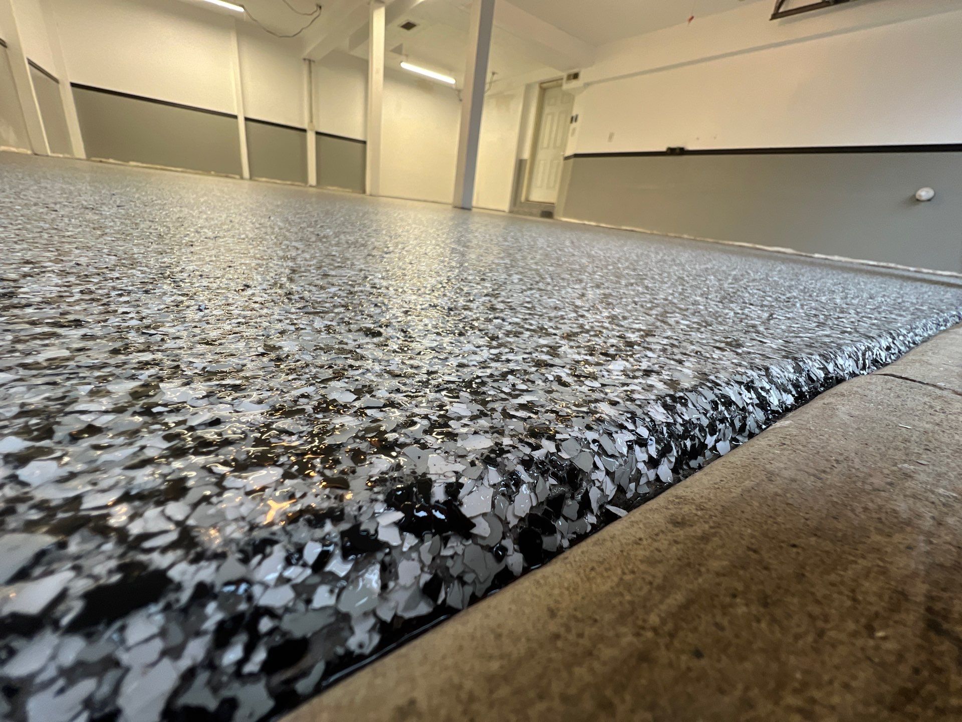 Garage Coating using Polyaspartic  by Cleveland Concrete Coatings 