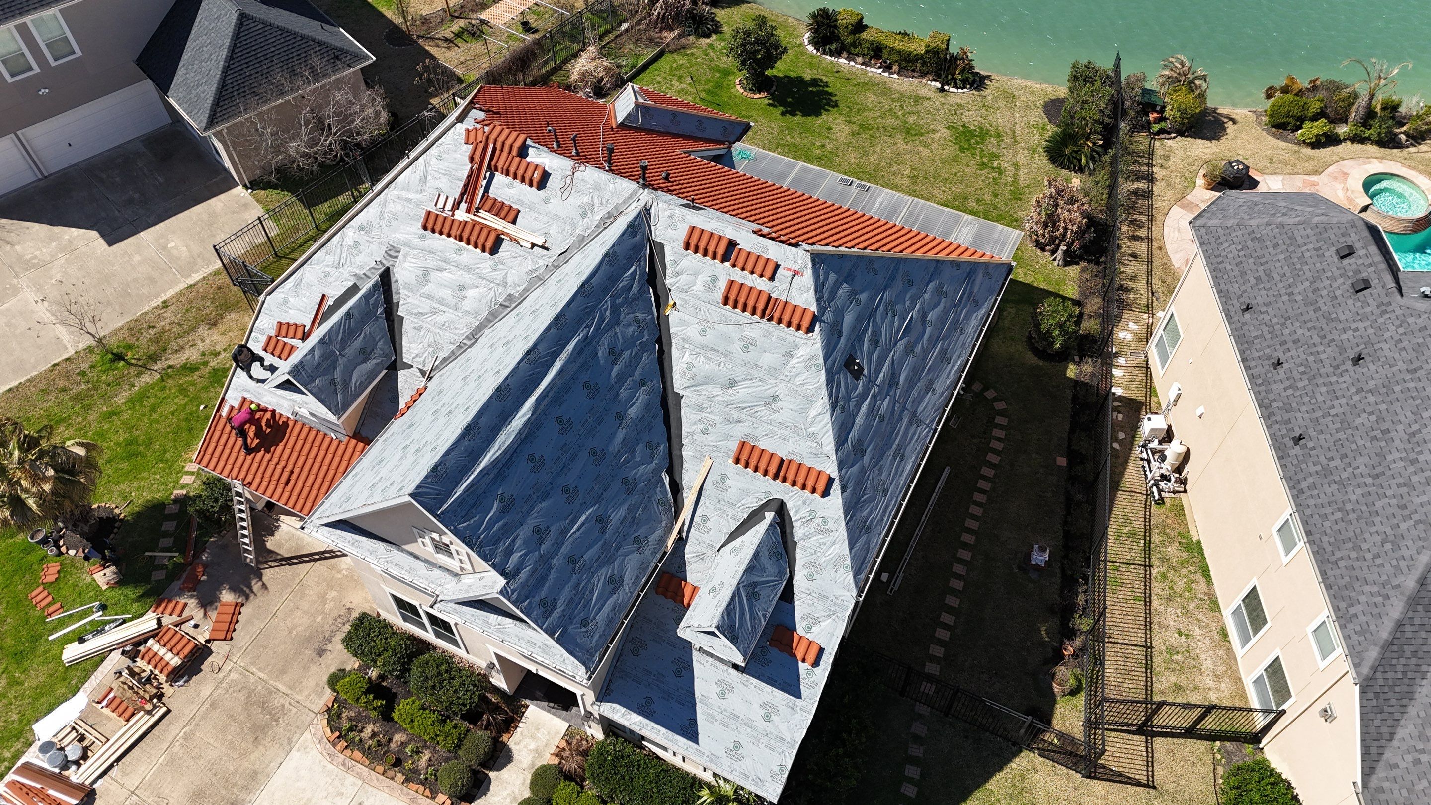 Stunning transformation using DECRA Villa Tile!  by Core Four Roofing