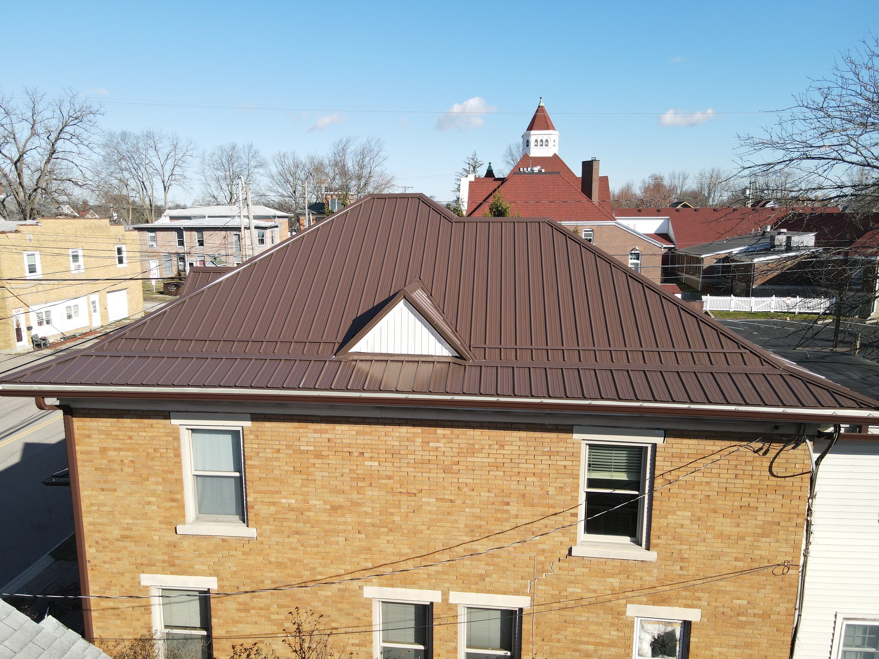 Residential Roofing Installation using Performance Panel Metal - Brown by RoofX