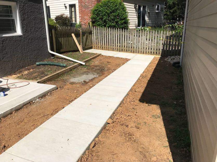 Exterior Repair using Concrete Pad/ walkway by Alpha Design Services