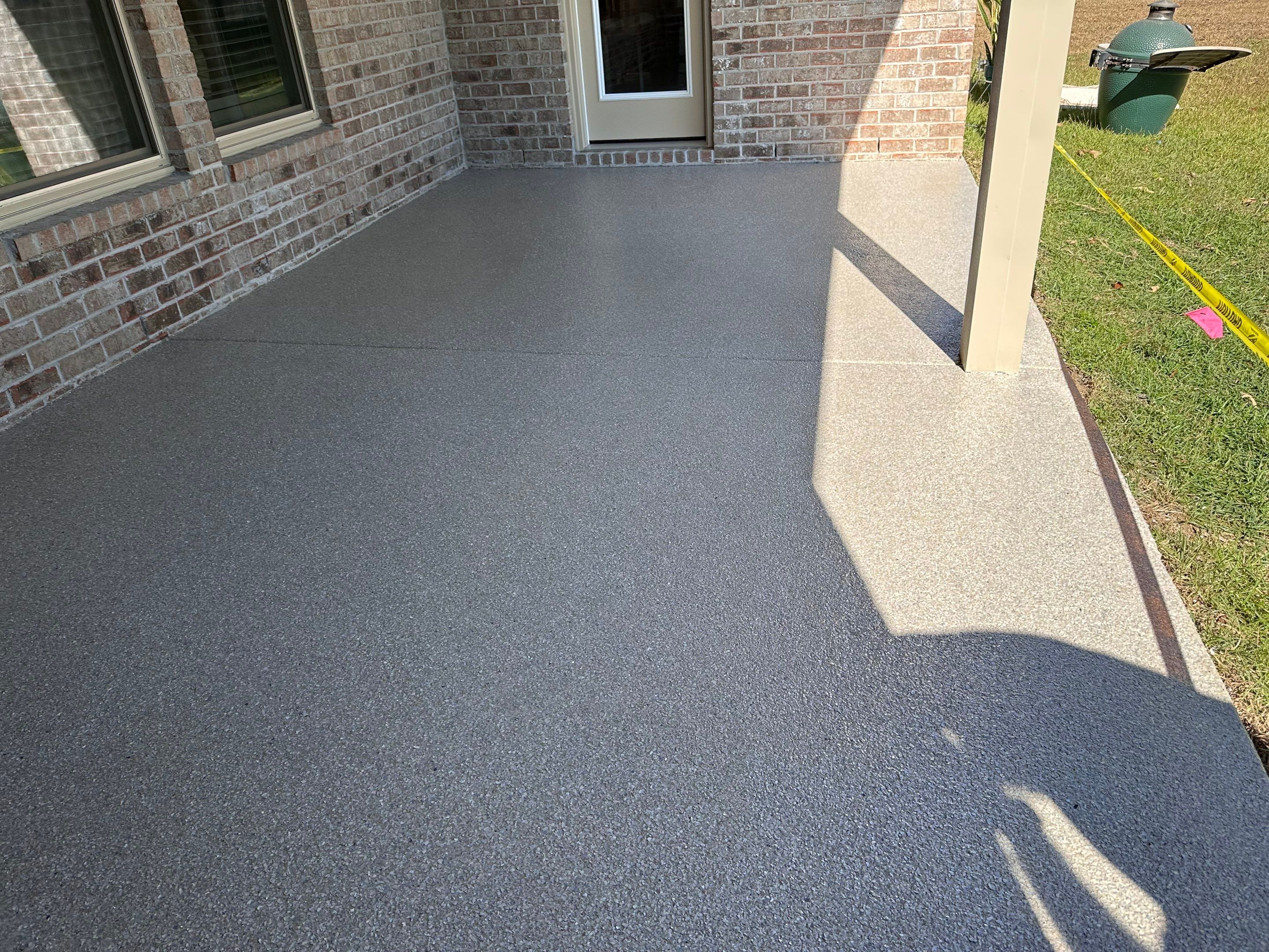 Epoxy Flake Garage and Patio Floor Coating in Cantonment, FL by Cornerstone Hard Surface Restoration 