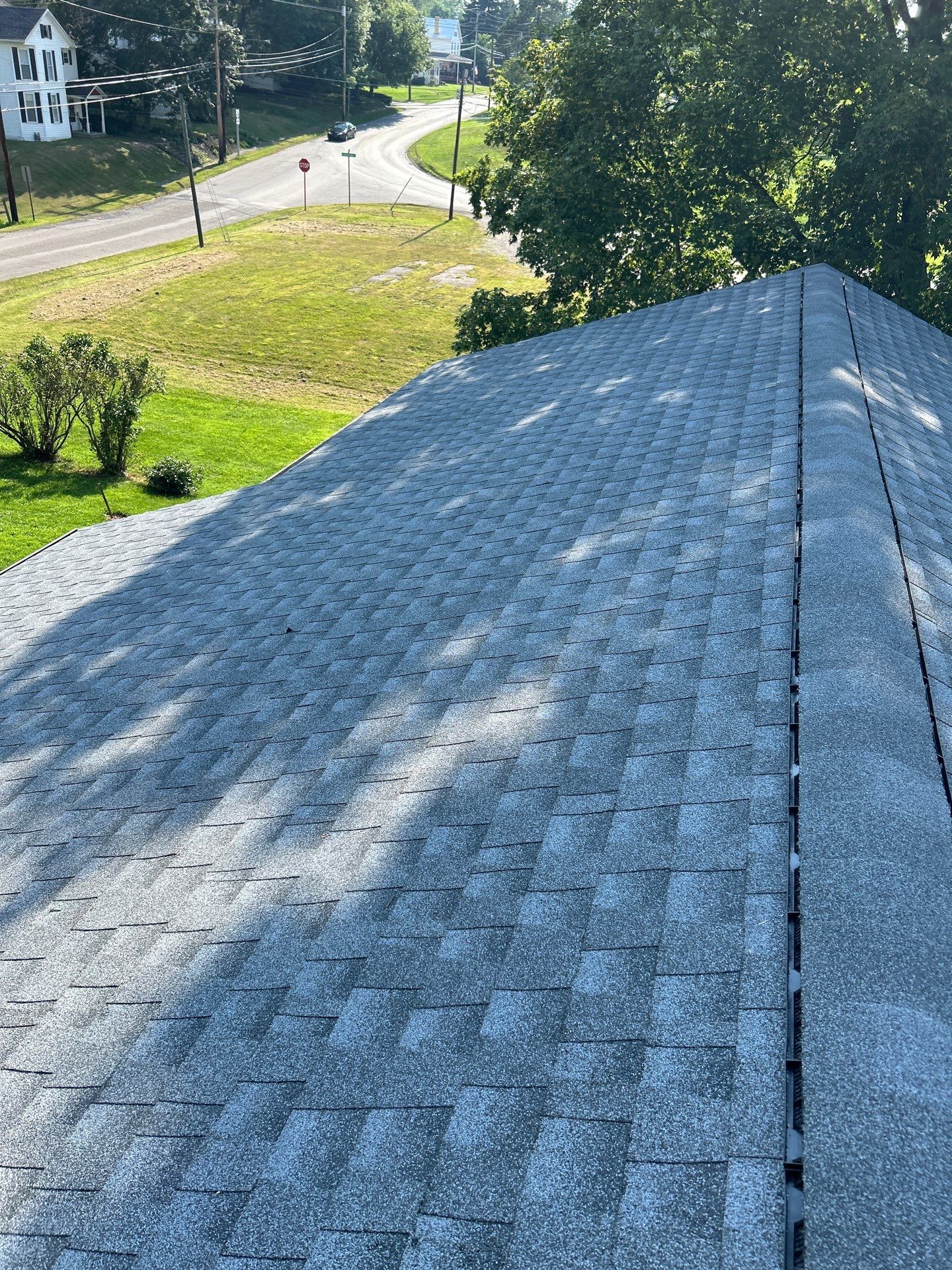 Residential Roofing Installation using GAF Timberline HDZ Oyster Grey by Rainstoppers Roofing