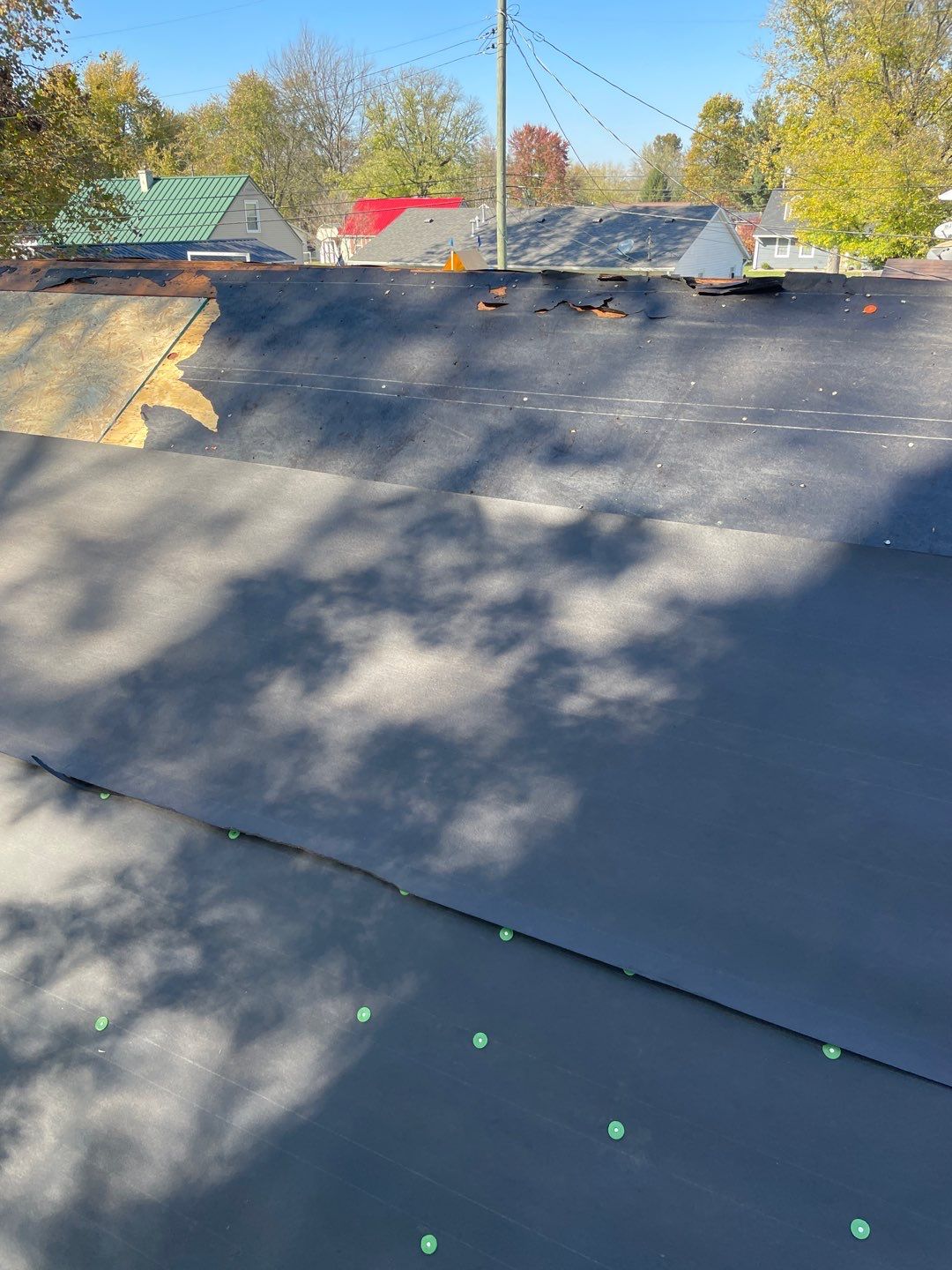 Residential Roofing Installation using Tamko Titan and aluminum siding repair by Storm Contracting 