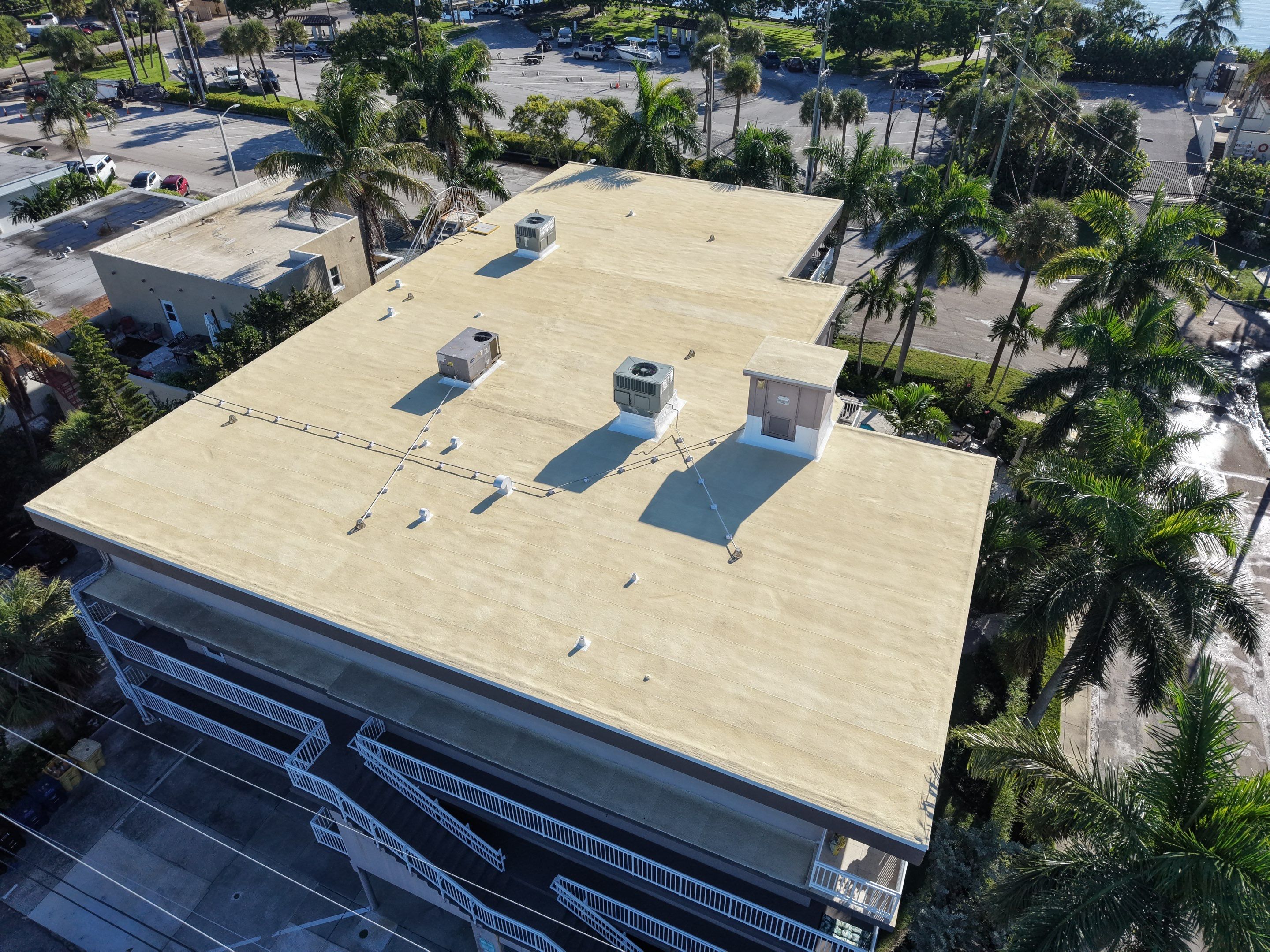 Commercial Roof Restoration for Lake Worth Beach Flat Roof Project by Roof King LLC