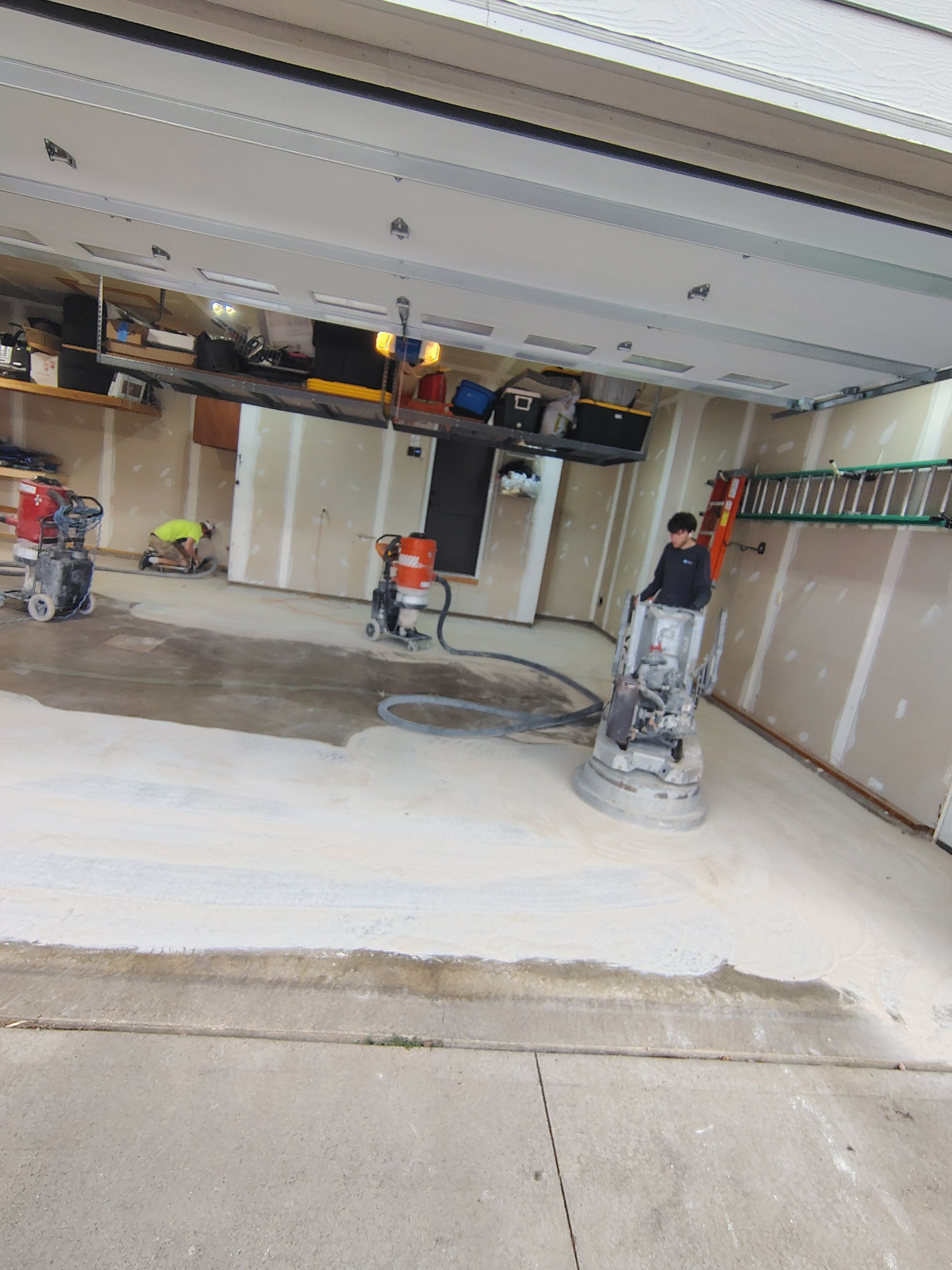 Sioux Falls Garage Concrete Grinding and Nightfall Decorative Chip Coating by Select Painting, Coatings & Garage Cabinets