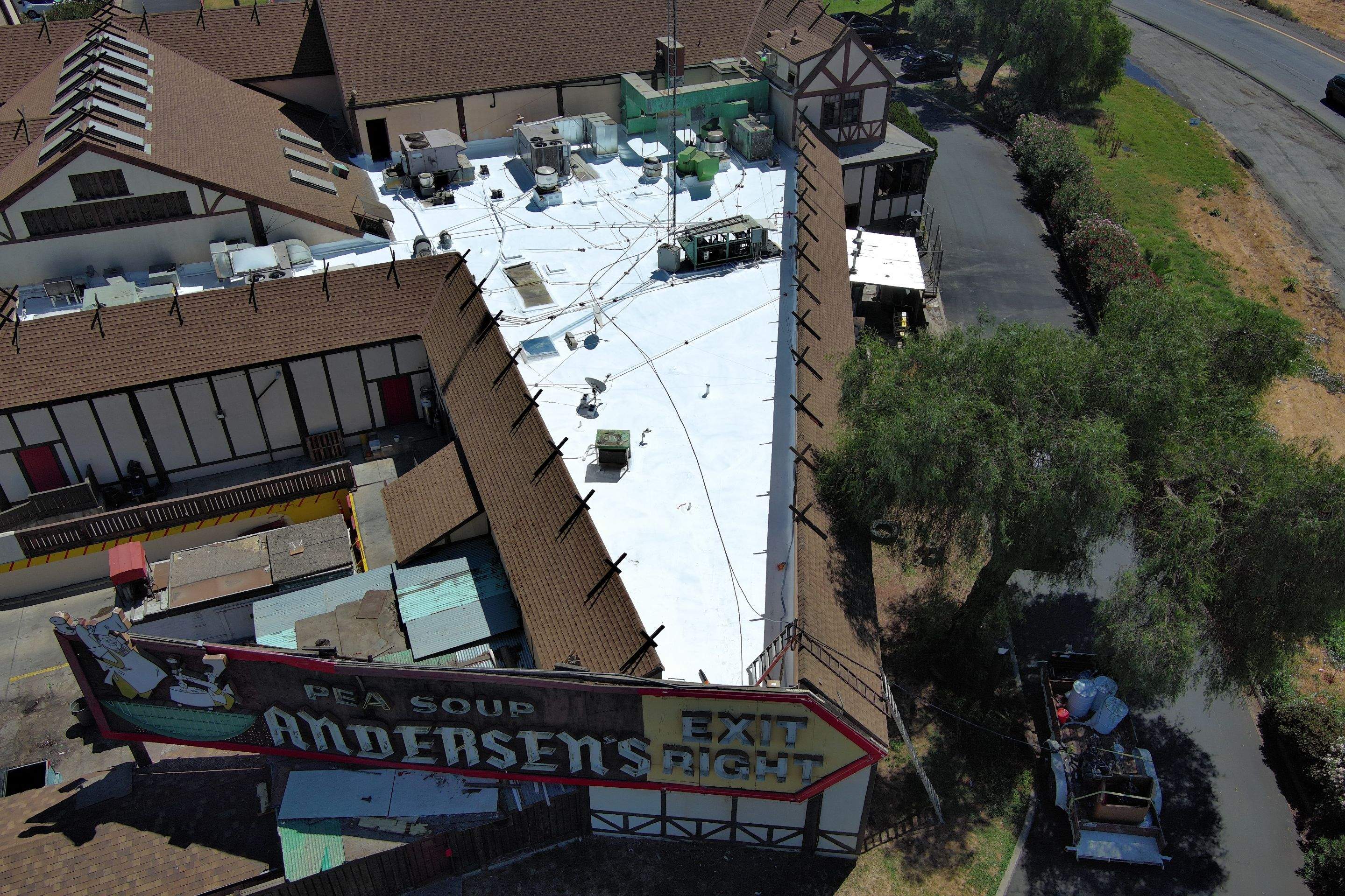 Spray foam and coatings using General Coatings acrylic coatings and spray foam by Straight Edge Roofing Inc