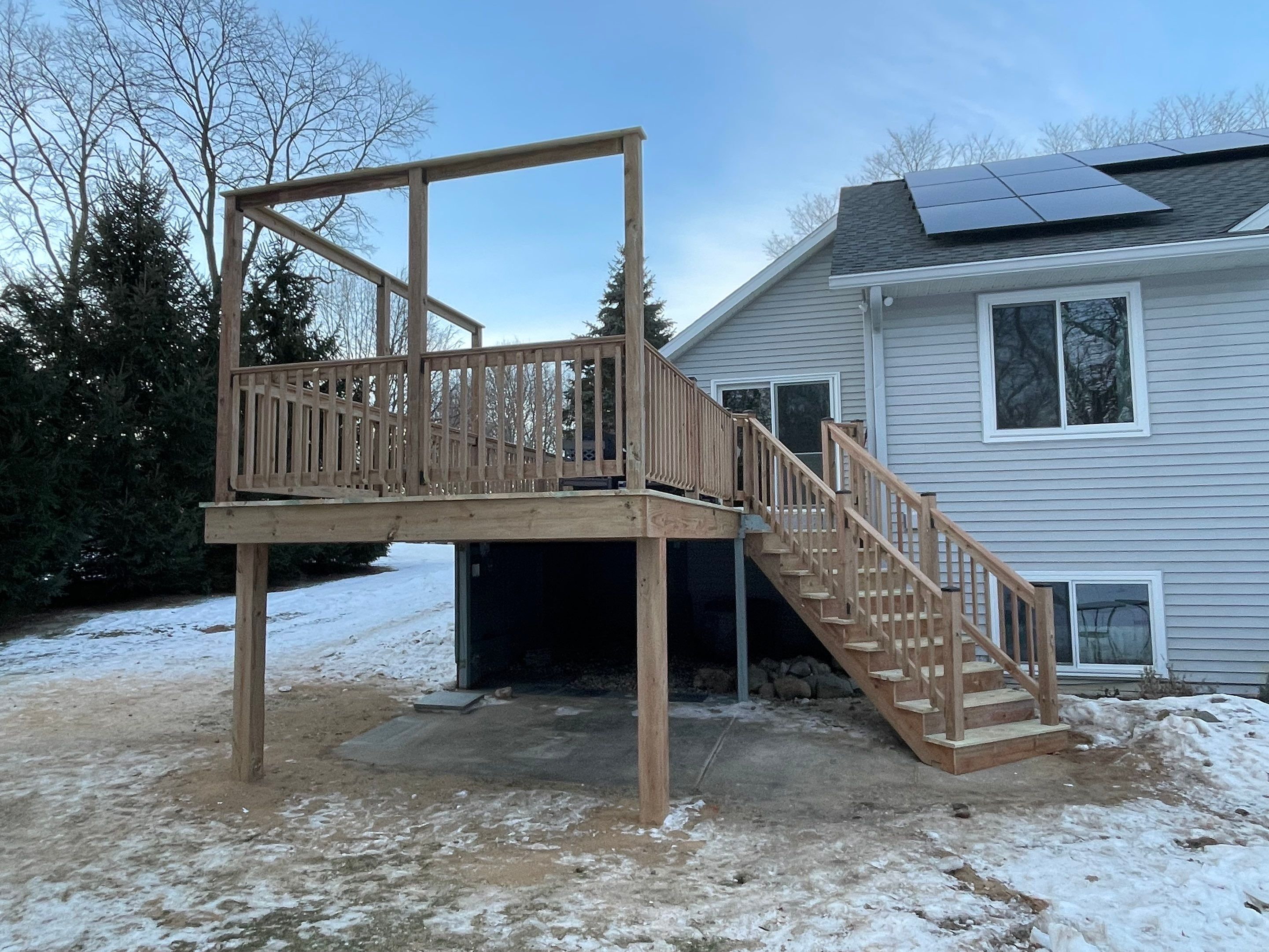 Deck Installation using Treated Lumber by Avalon Roofing and Exteriors