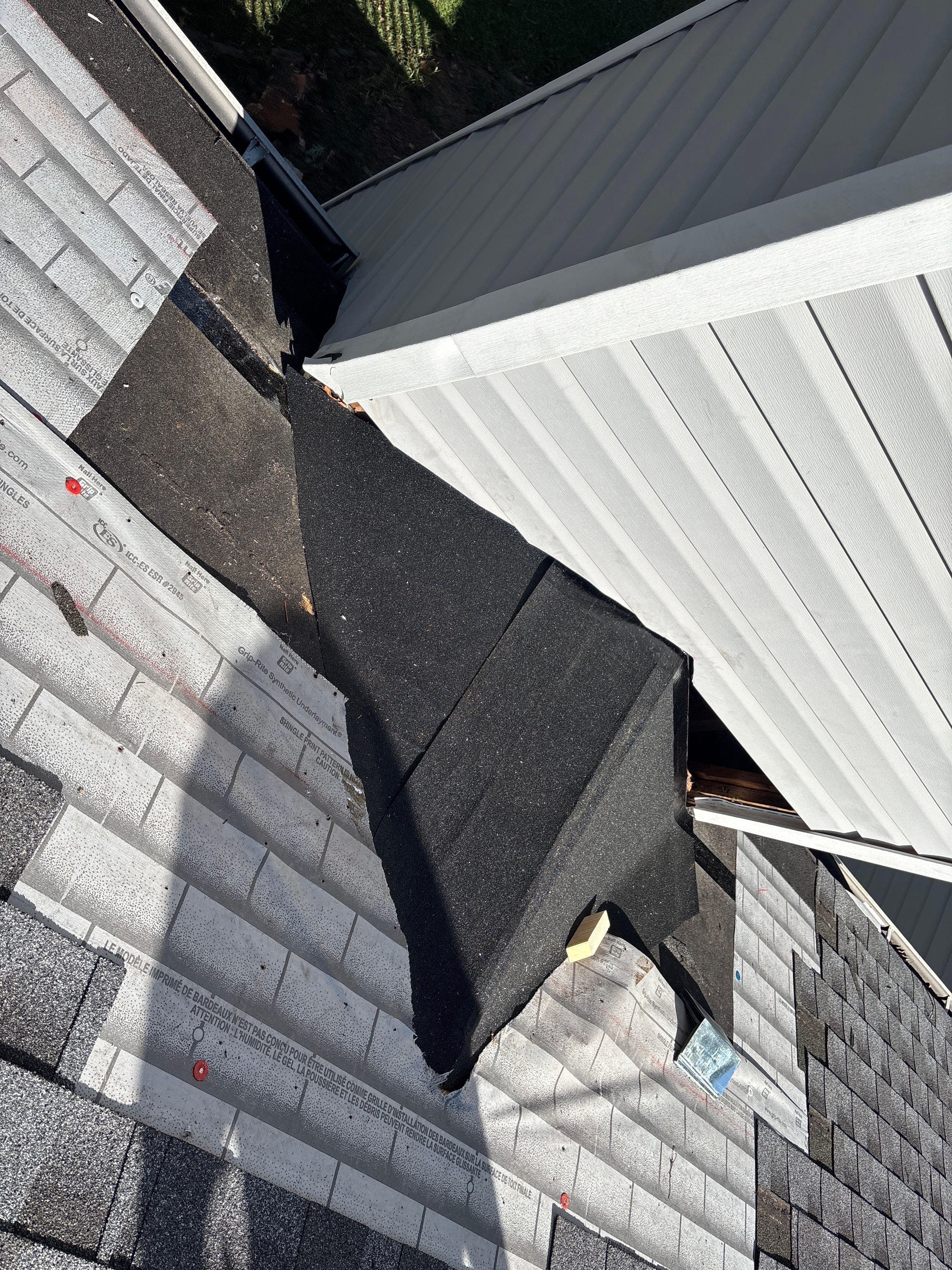 Poor roof installation by Deerfield Roofing LLC