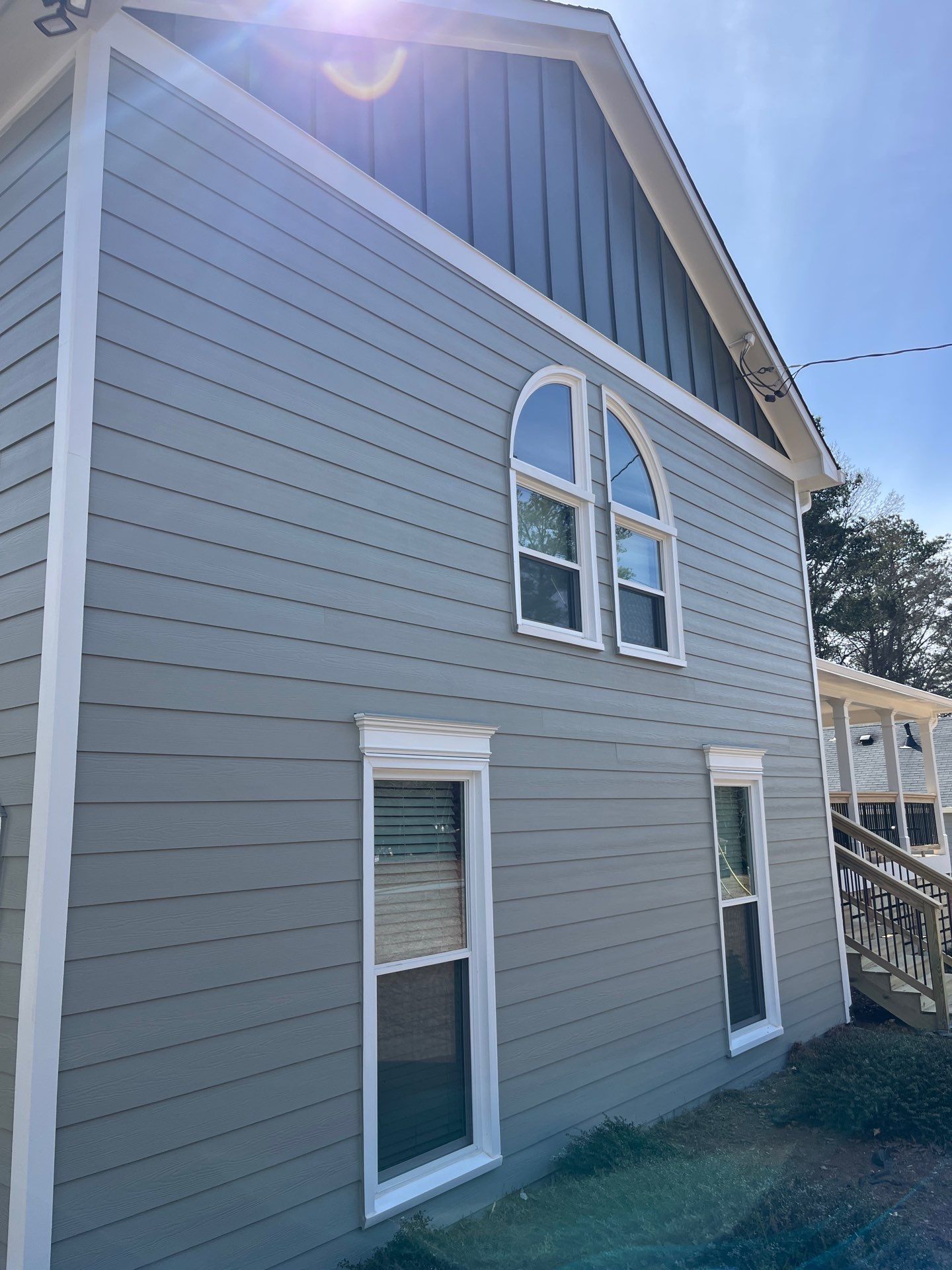 Acworth, GA James Hardie Board and Batten Siding Installation, Porch Renovation, Exterior Painting, and Window Replacement by Nelson Exteriors 