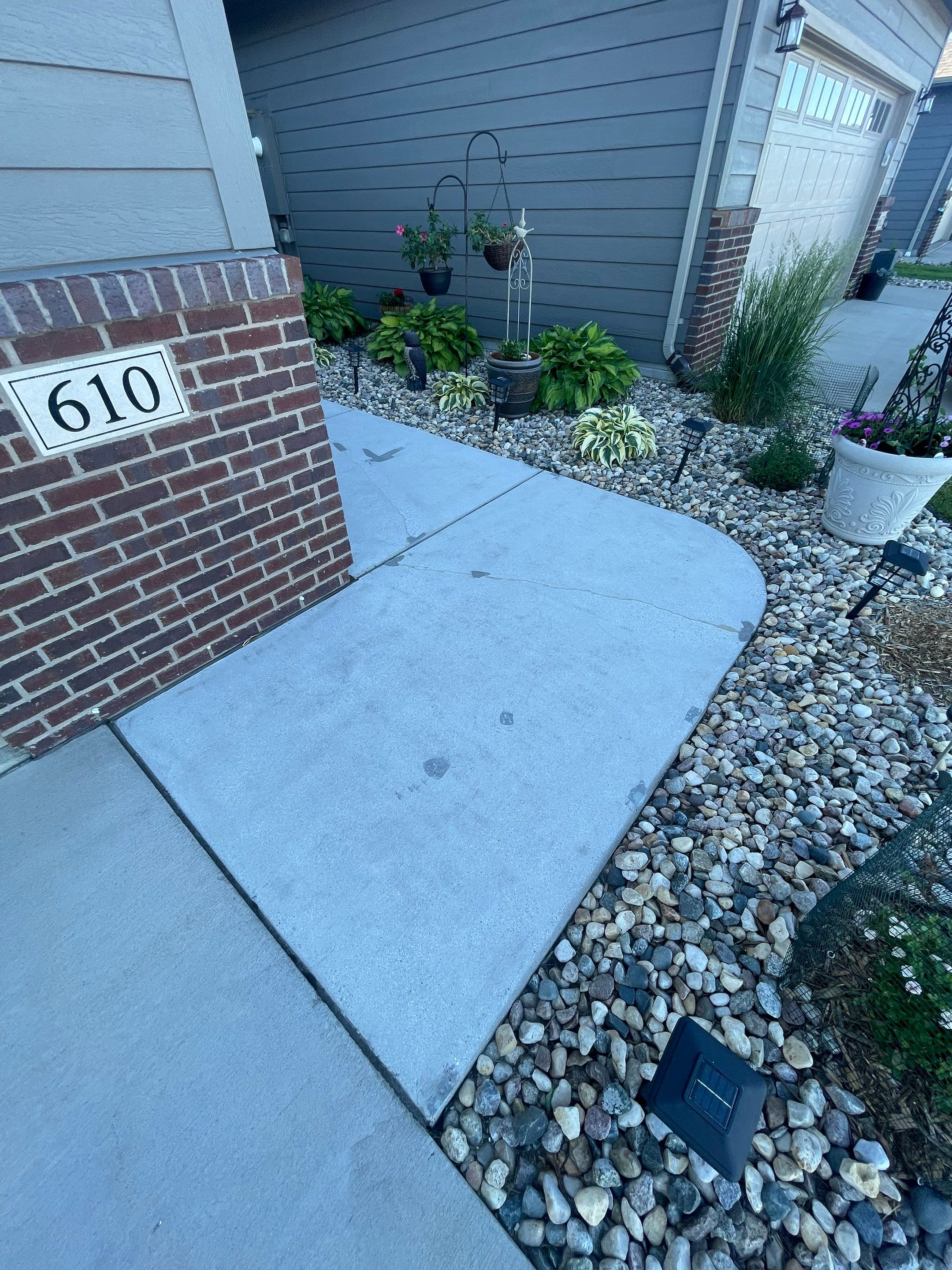 Custom Concrete Coating for Sioux Falls Patio and Front Walkway by Select Painting, Coatings & Garage Cabinets