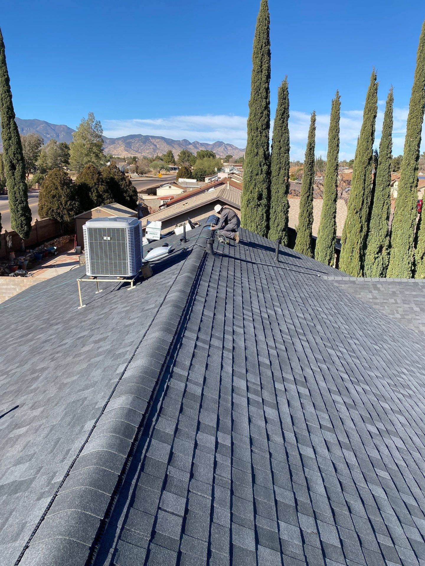 Onyx Black Shingles by Reimagine Roofing
