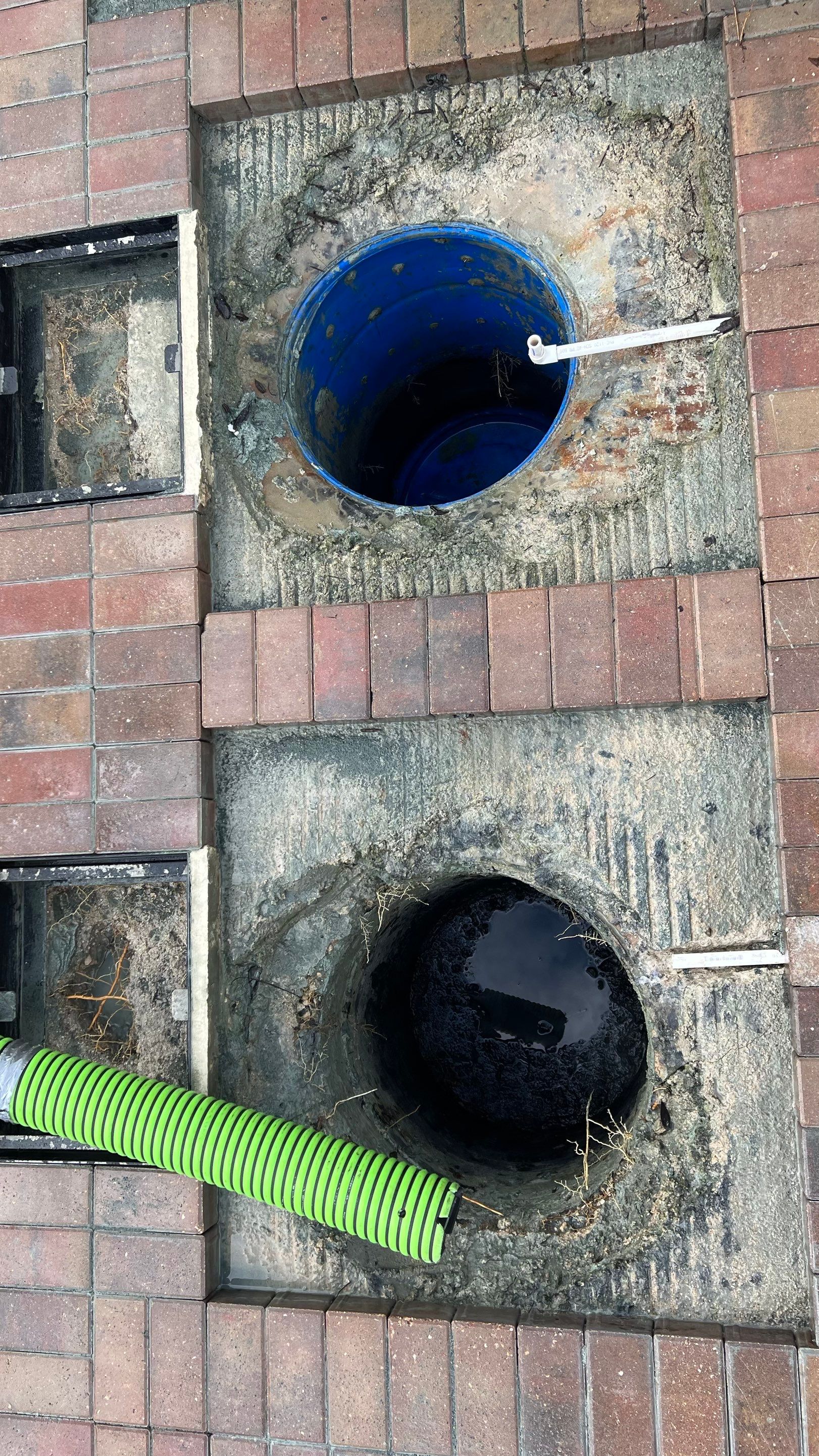 Cleaning Tennis Court Catch Basins by Don Mar, Inc. Storm Water Solutions