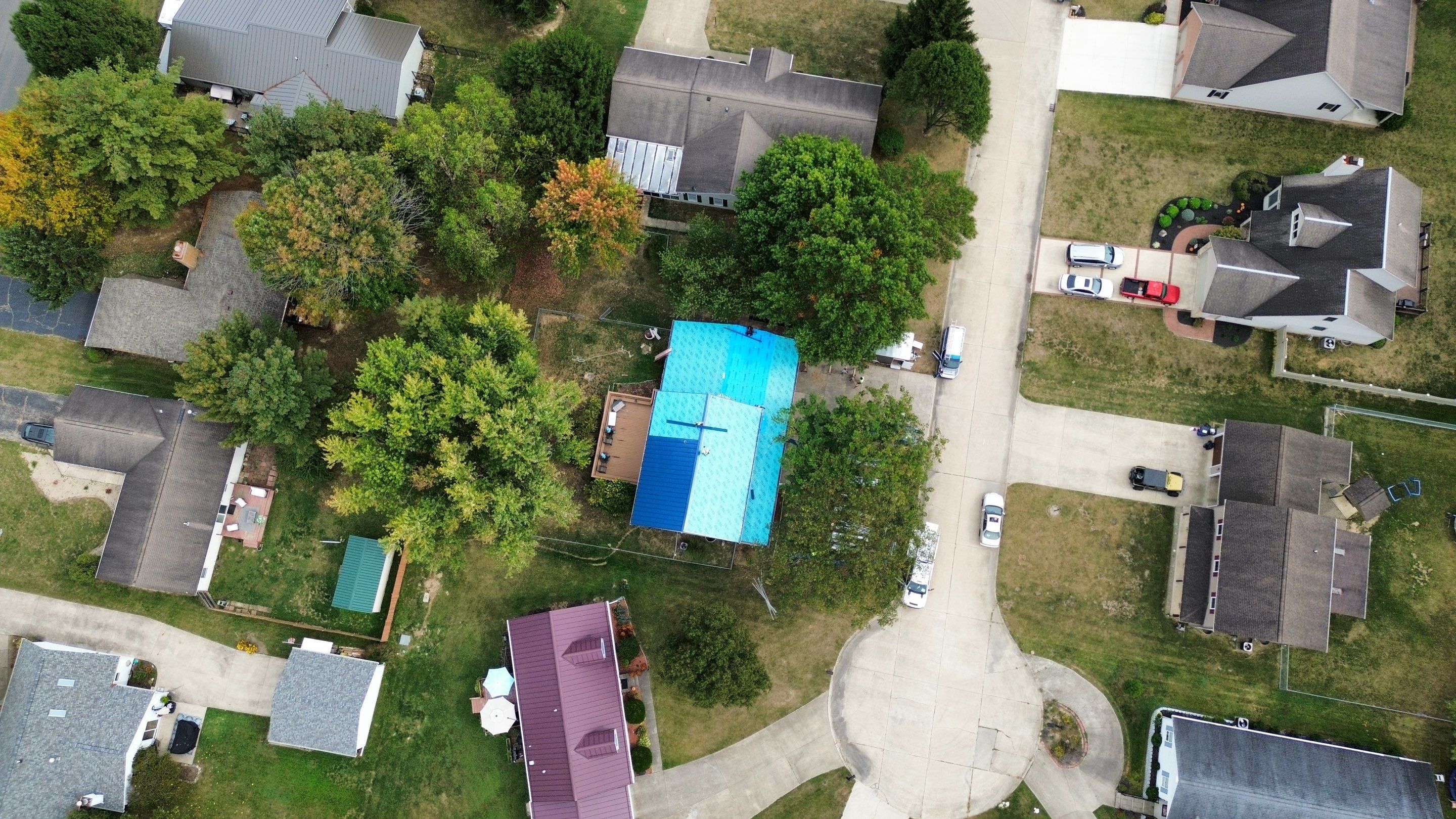 Residential Roofing Installation using Standing Seam Metal - Gallary Blue by RoofX 