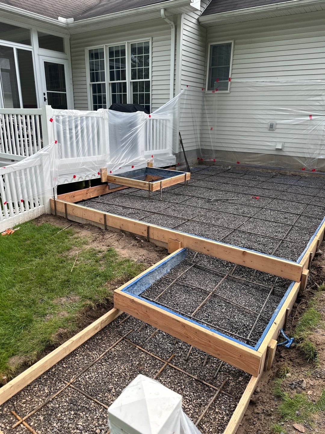 Majestic ashlar stamped concrete patio  by NG Masonry & Construction LLC