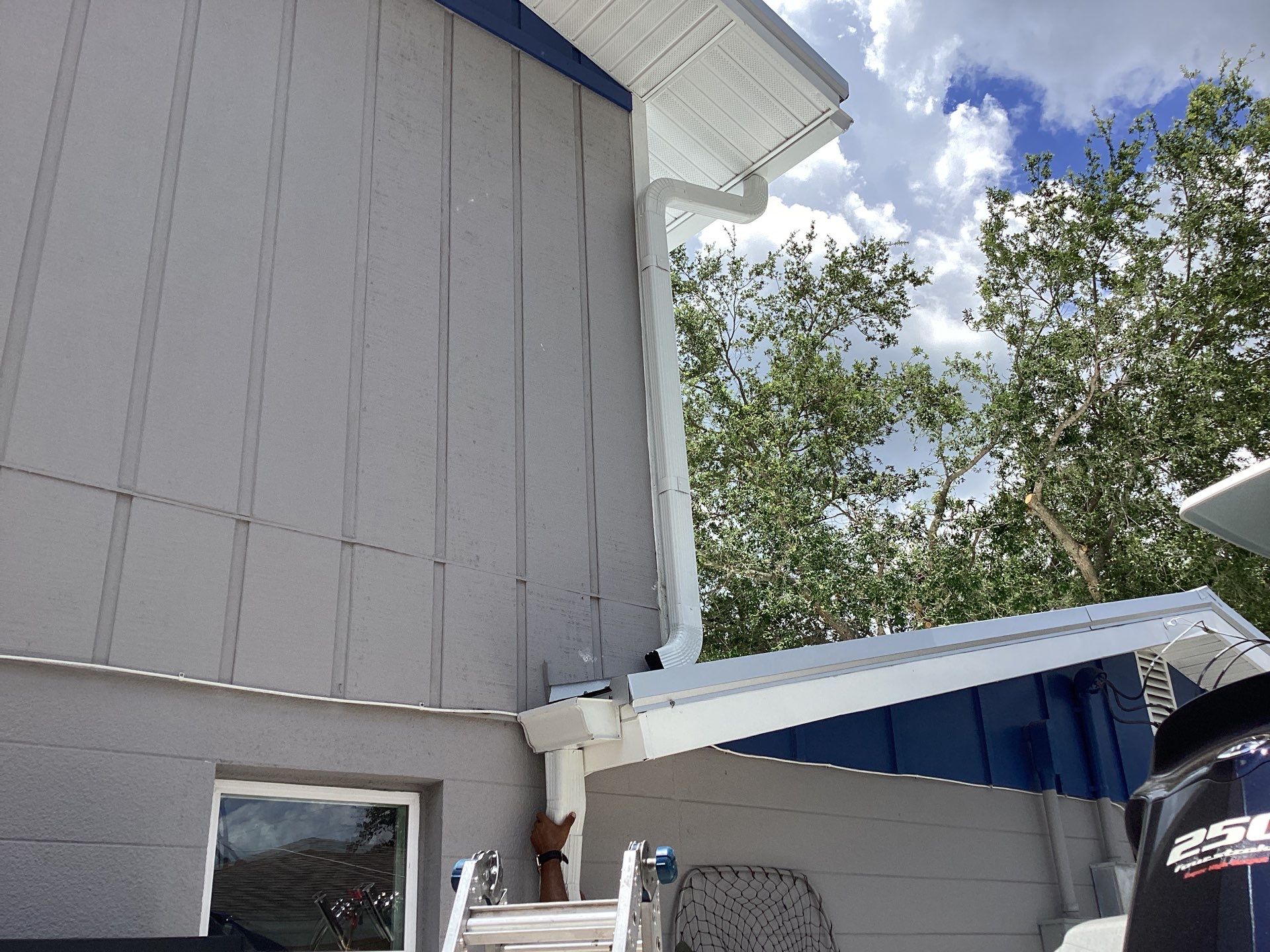 White K Style Seamless Gutters using 3X4 Elbow Downspout in Sarasota FL by Gutter Professors