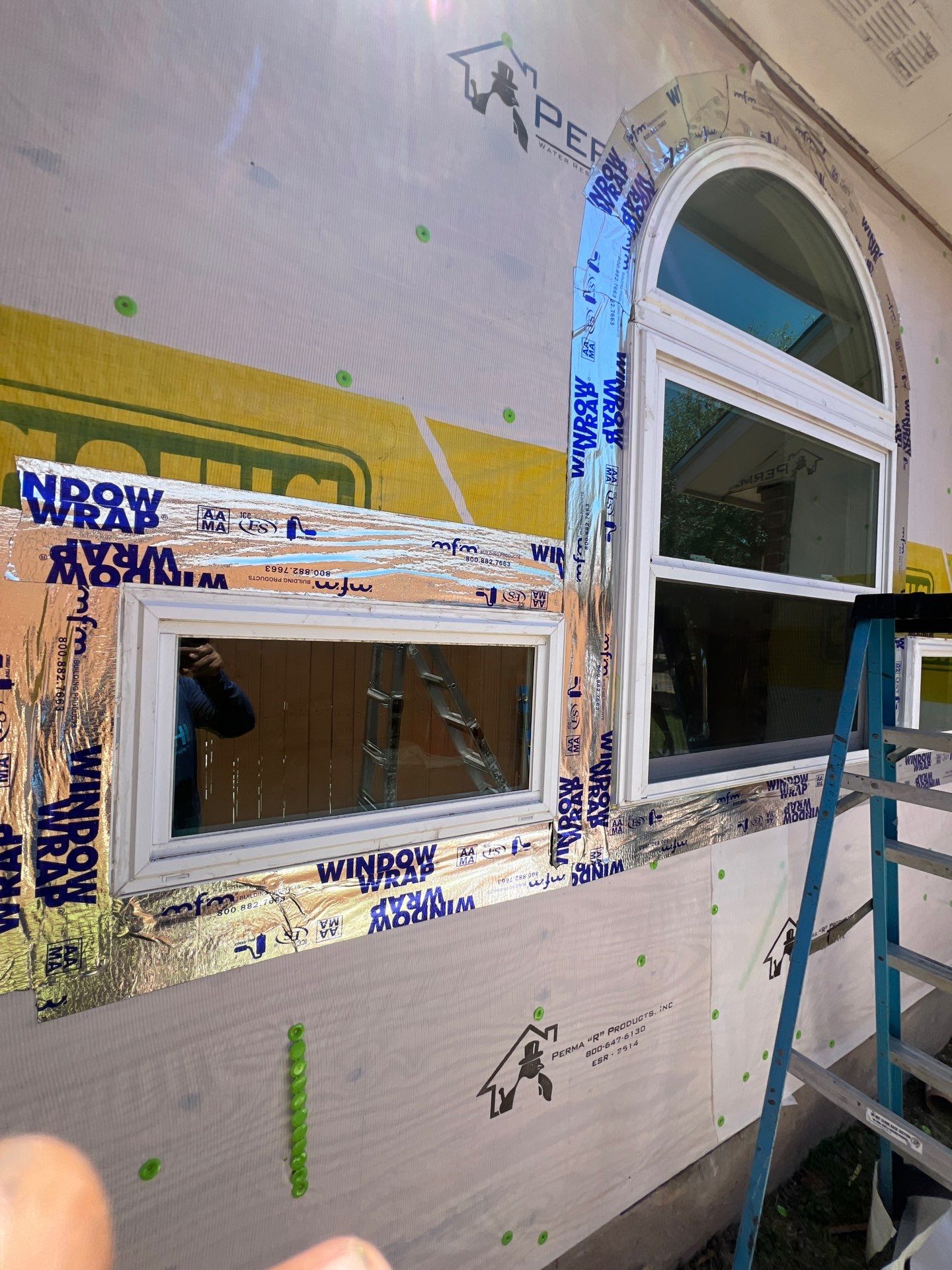 Windows with a side of Siding by Bayfront Roofing and Construction