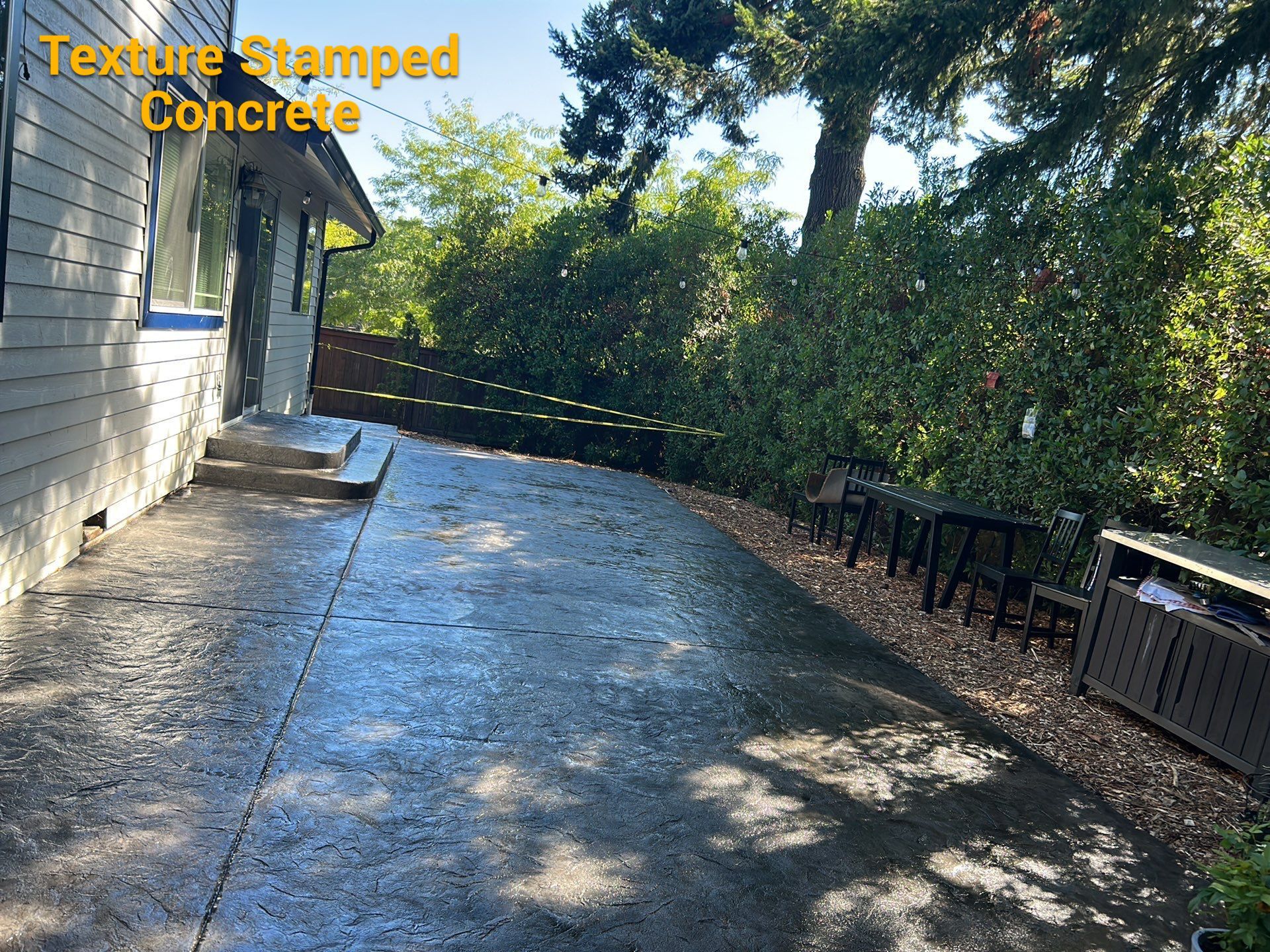 Luo | Colored Stamped Concrete Patio by Jireh Asphalt & Concrete Inc 