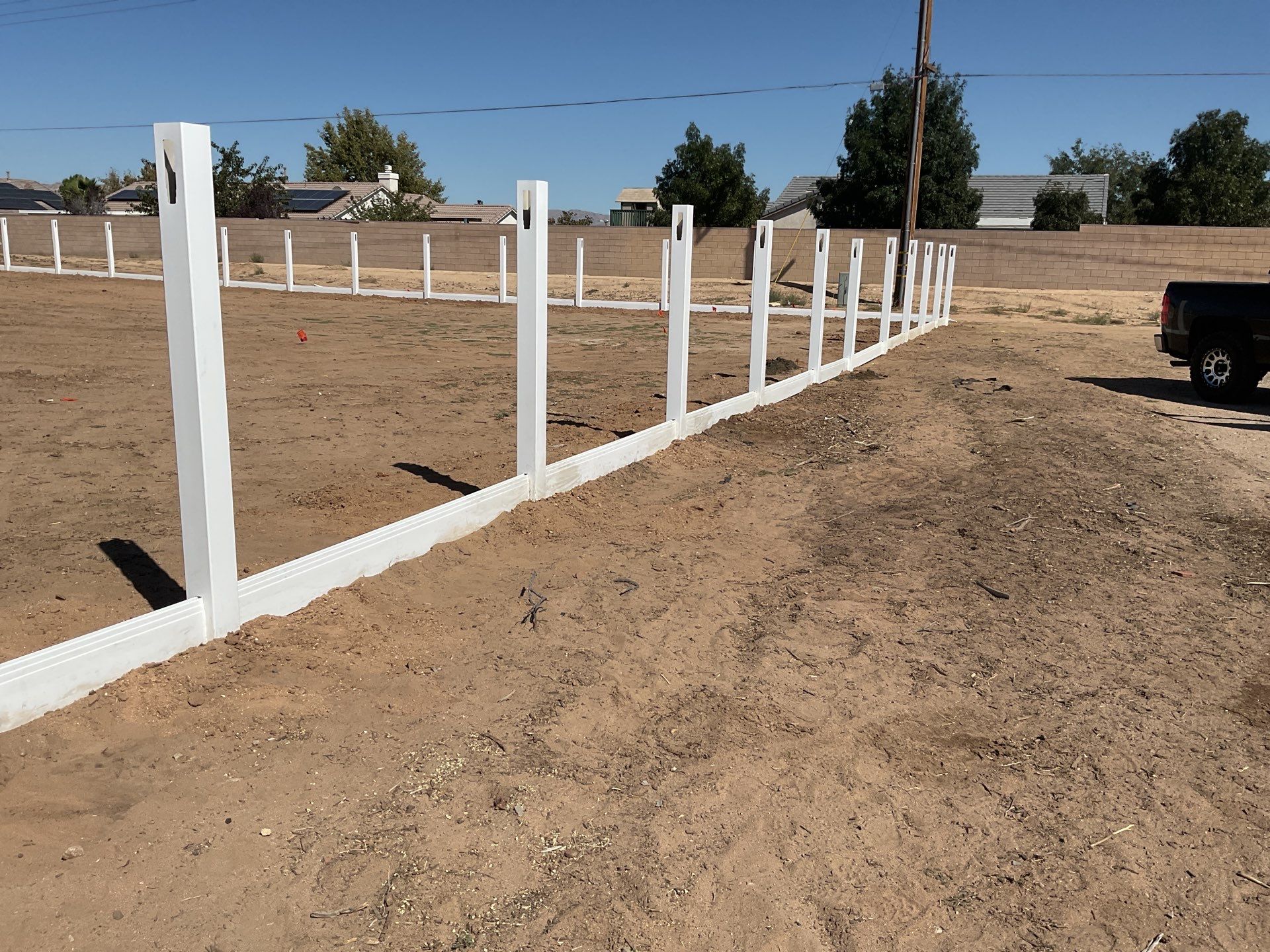 White picket fence  by Fence Guys Inc. 