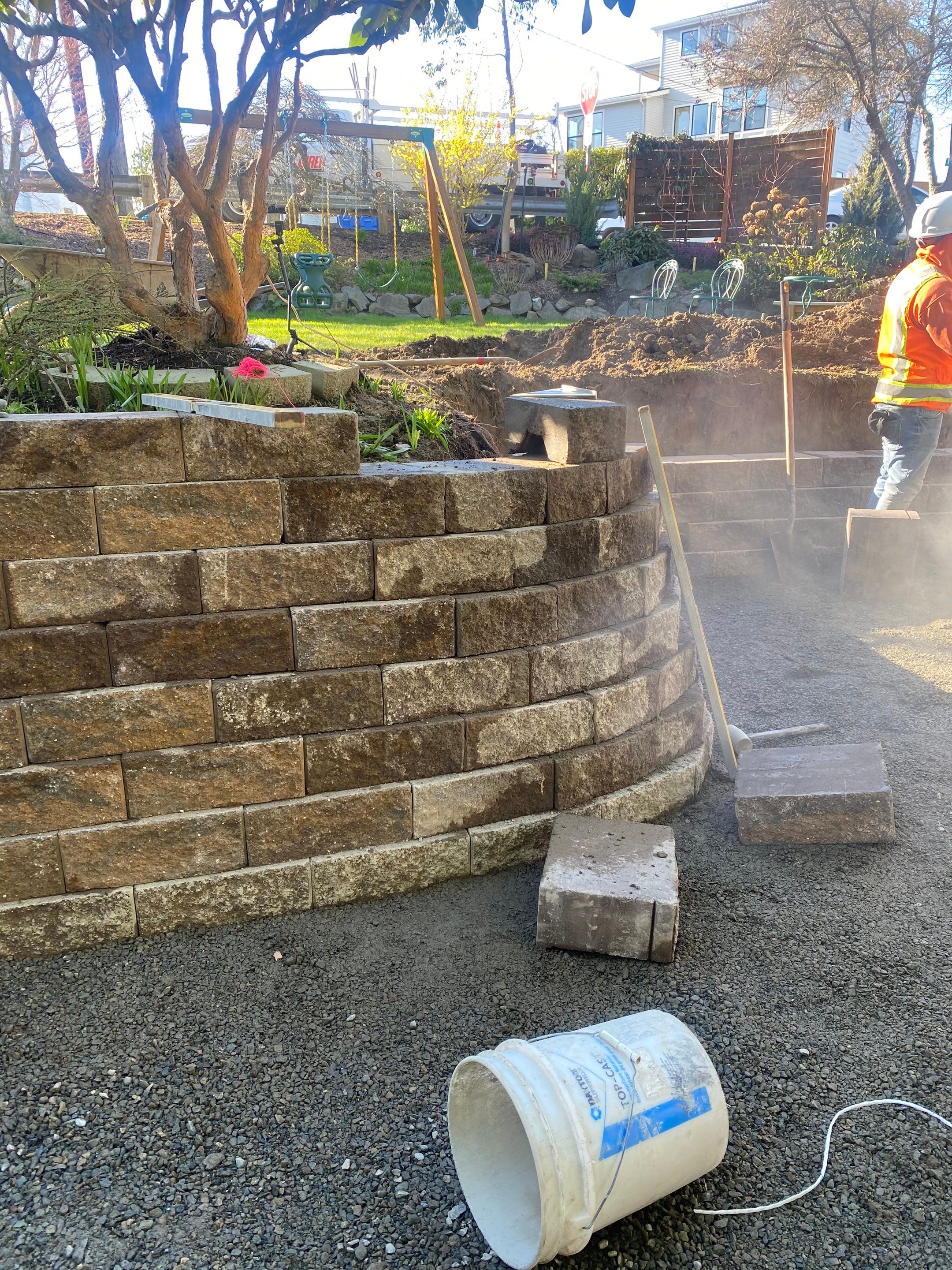 Lorra | Asphalt Driveway Repair & Retaining Wall by Jireh Asphalt & Concrete Inc 
