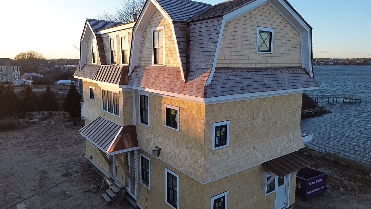 Great Island - Red Cedar Roofing, Yellow Cedar Siding, Standing Seam Copper, & Copper Gutters by Rinaldi Brothers