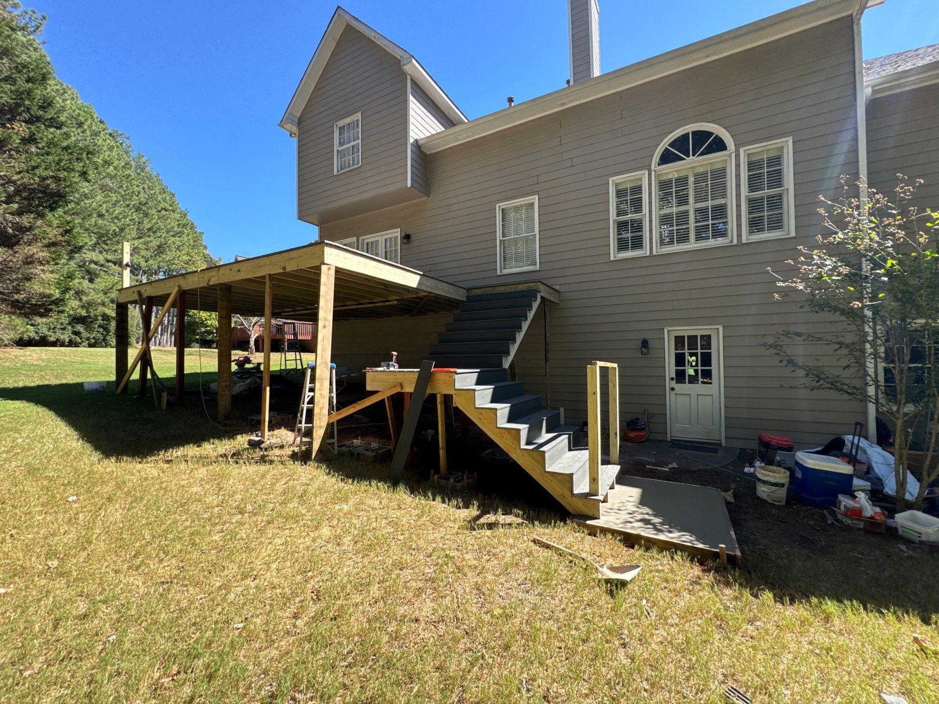 Elevated Multi-Level Composite Deck Replacement in Duluth, Georgia by Swift Home Renovations